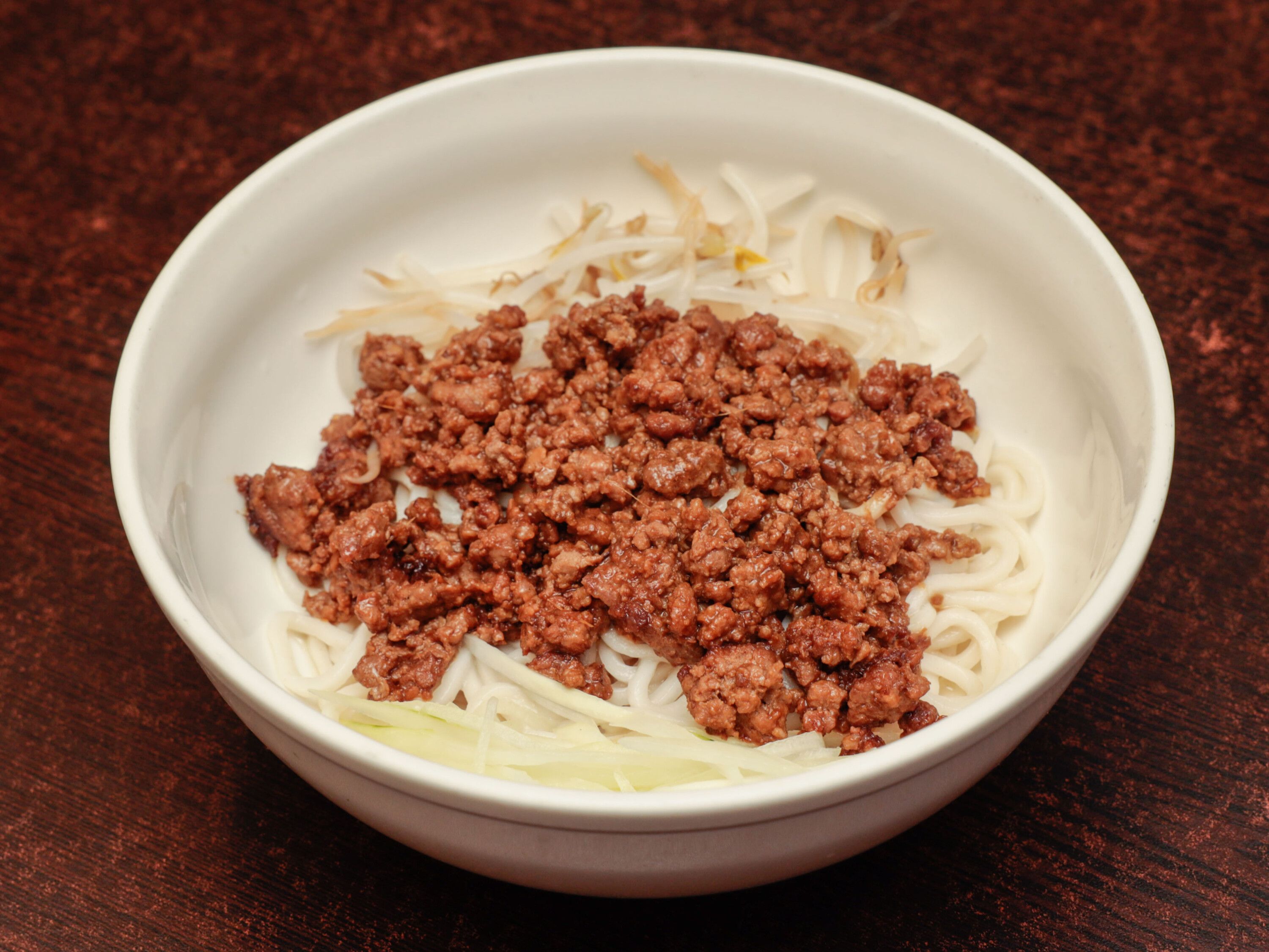 Order Noodles with Ground Pork and Bean Paste Sauce 炸醬麵 food online from A&J Bistro 半畝園 store, East Hanover on bringmethat.com