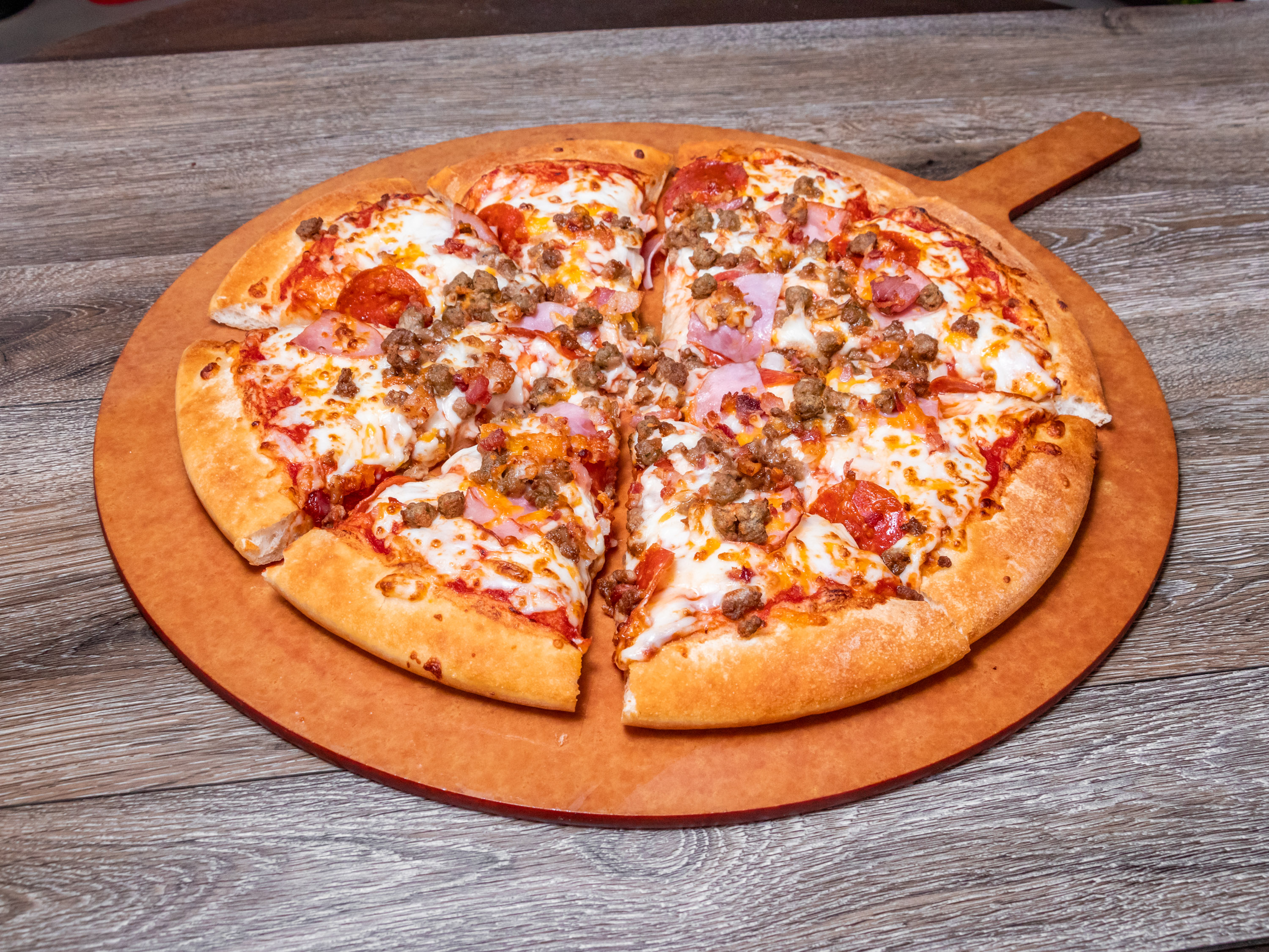 Order Meaty Max Specialty Pizza food online from Pizza Inn store, Baytown on bringmethat.com