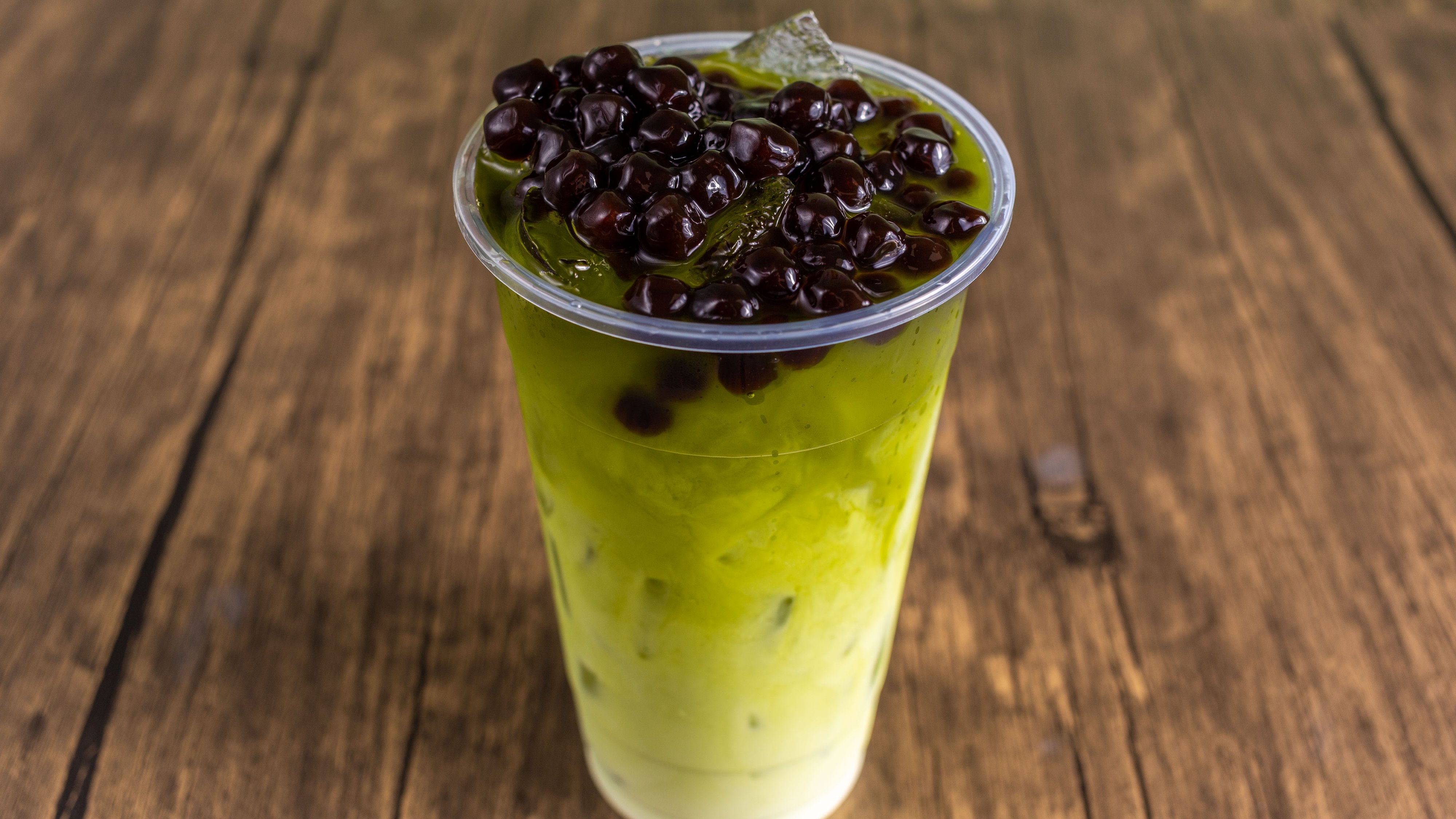 Order Thai Iced Green Tea Special food online from St Boba N Donuts store, Burbank on bringmethat.com