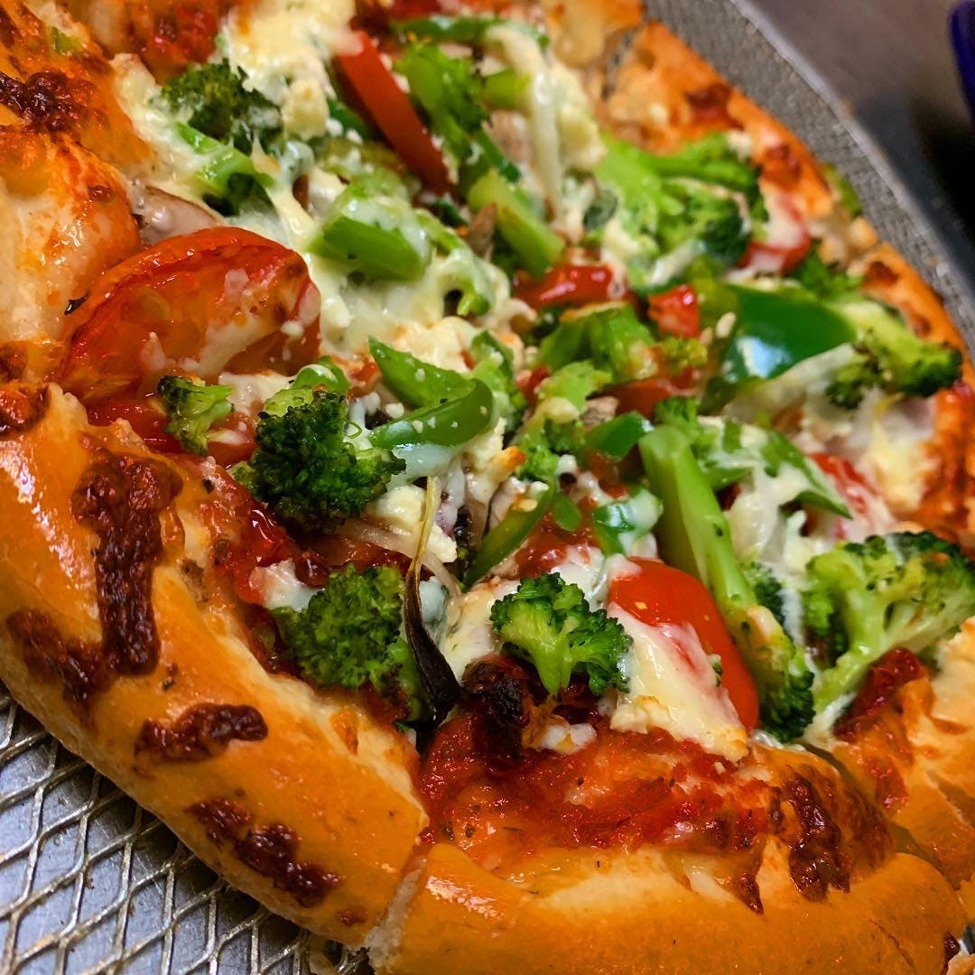 Order Athena Pizza - 10'' food online from Holiday Pizza store, Statesboro on bringmethat.com