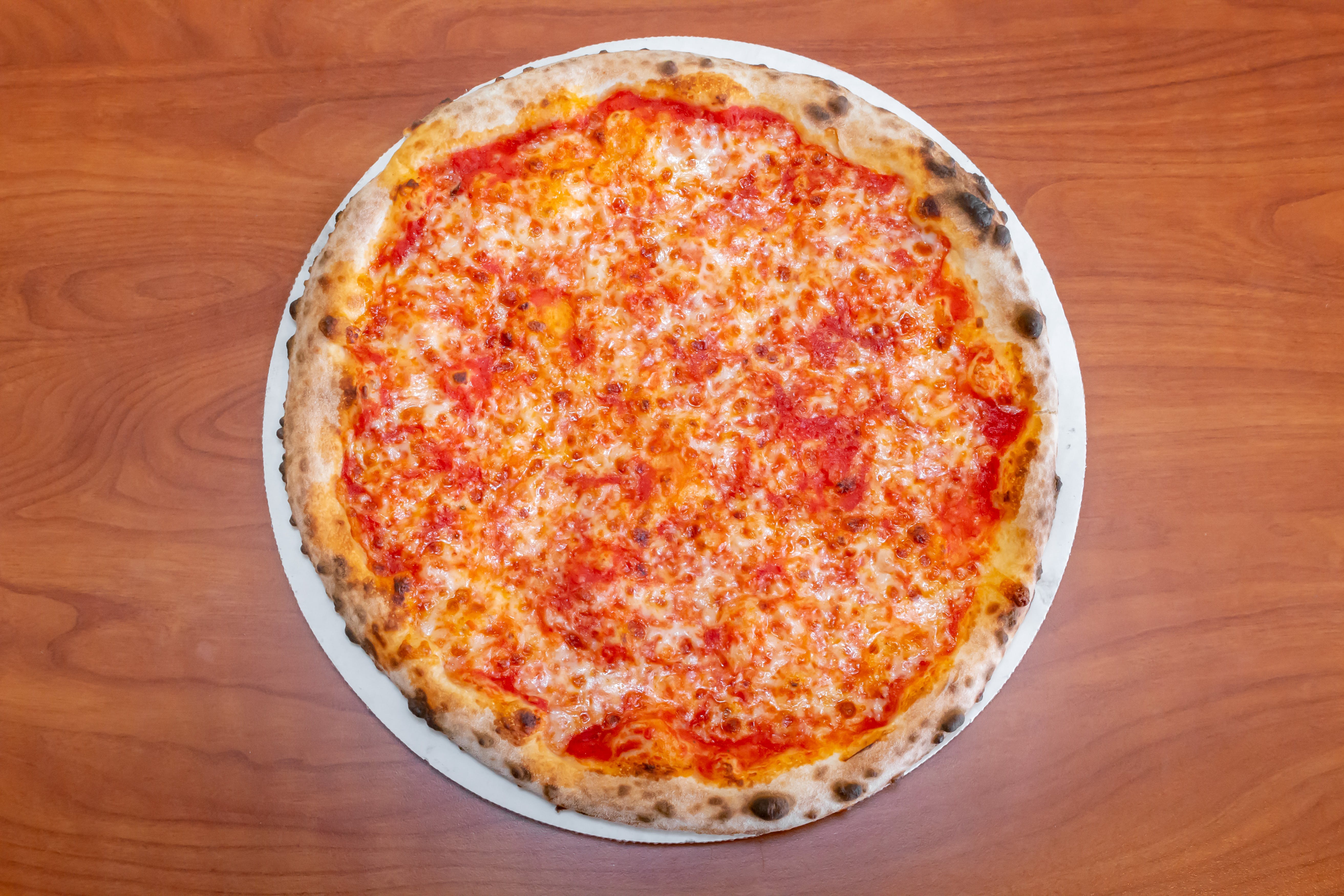 Order Cheese Pizza - Medium 12'' (8 Slices) food online from Serino's Italian Deli store, Addison on bringmethat.com