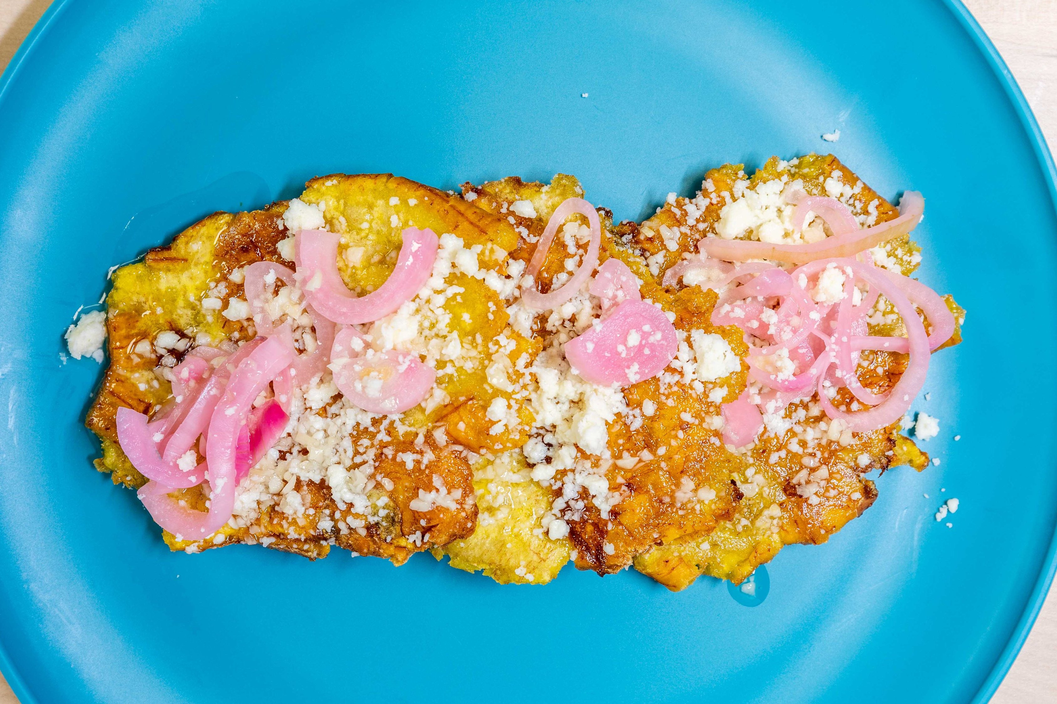 Order Tostones food online from Them Chicken Legs store, Oakland on bringmethat.com