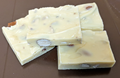 Order White Chocolate Almond Bark food online from Painted Turtle Chocolatier store, Osseo on bringmethat.com