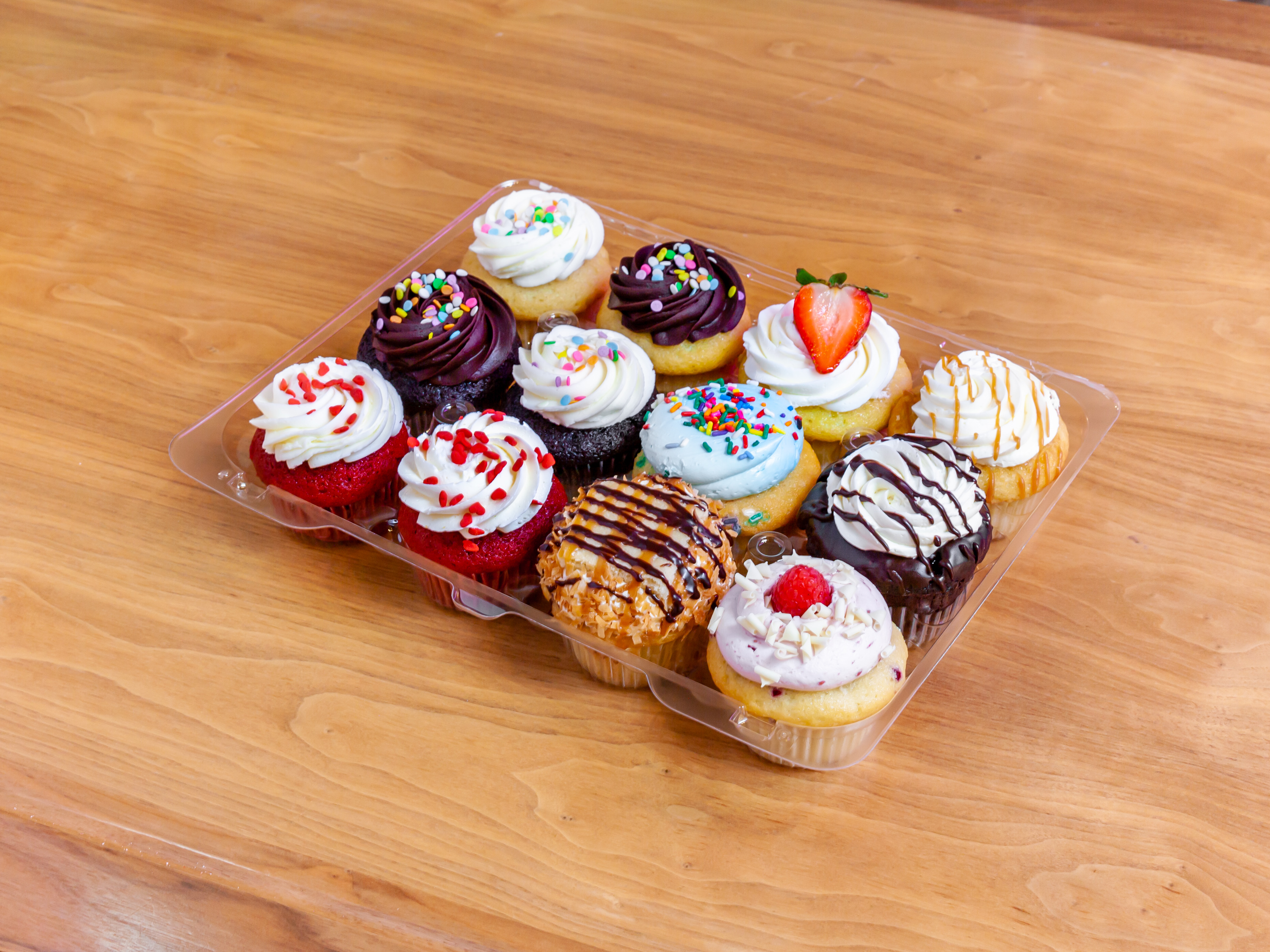 Order 1 Dozen Mix of Classic and Center-Filled Molly's Cupcakes food online from Molly's Cupcakes store, Chicago on bringmethat.com