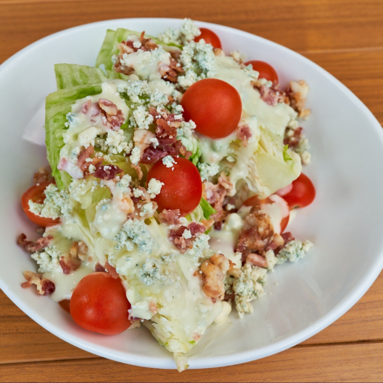 Order Wedge Salad food online from Jimmy E Bar + Grill store, Signal Hill on bringmethat.com
