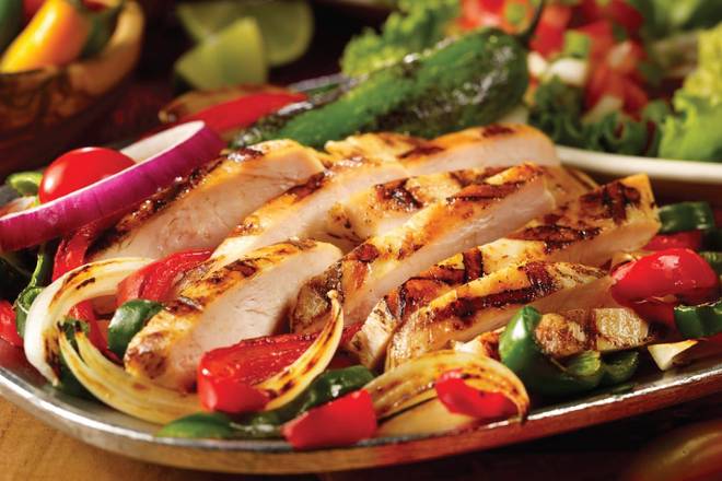 Order Steak and/or Chicken Fajitas for One food online from Uncle Julio store, Bridgewater Township on bringmethat.com