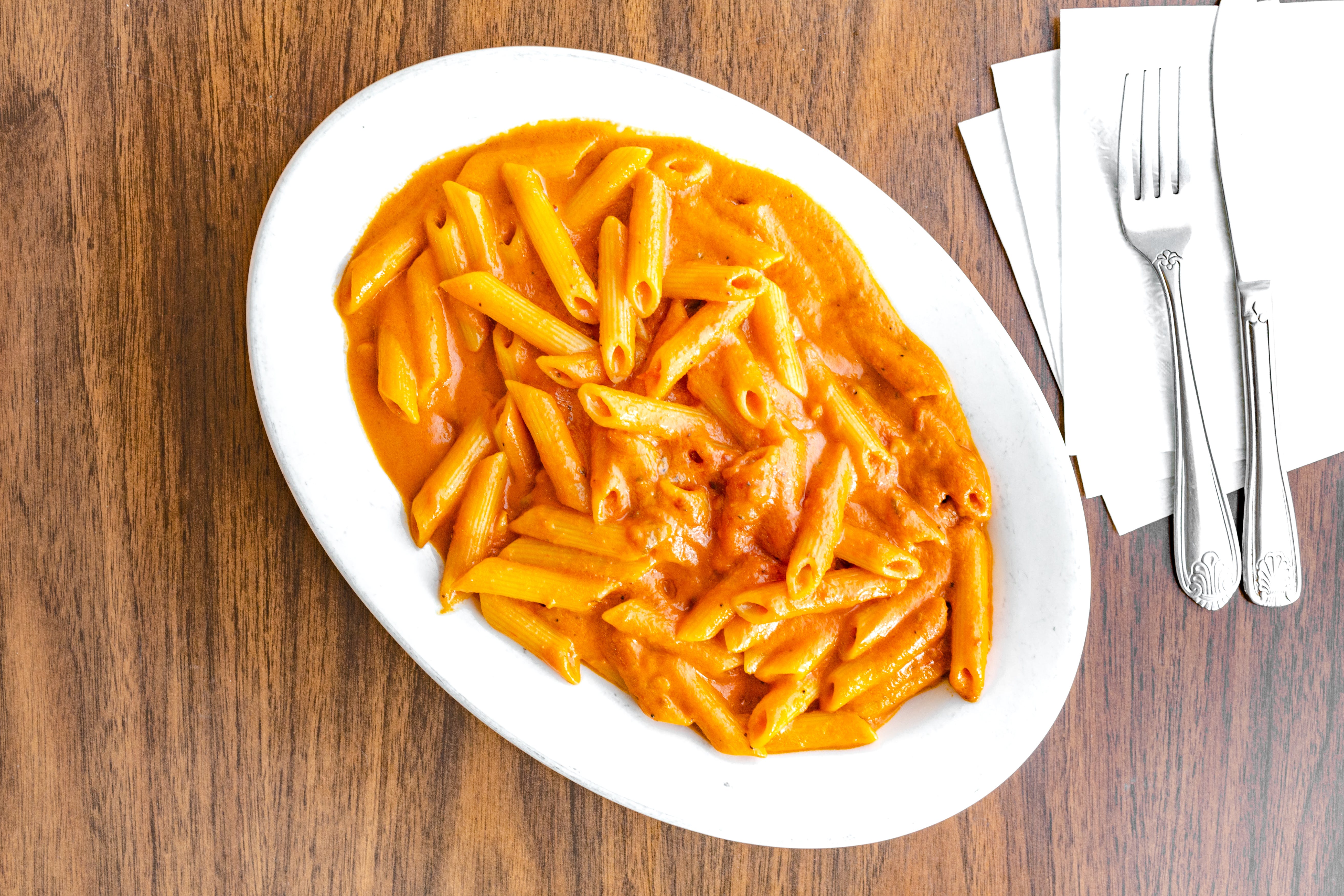 Order Penne with Vodka Sauce - Pasta food online from Fratelli Pizza Cafe store, Edison on bringmethat.com