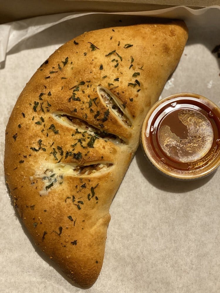 Order Spicy Sausage Calzone - Calzone food online from Brooklyns Finest Pizza store, Denver on bringmethat.com