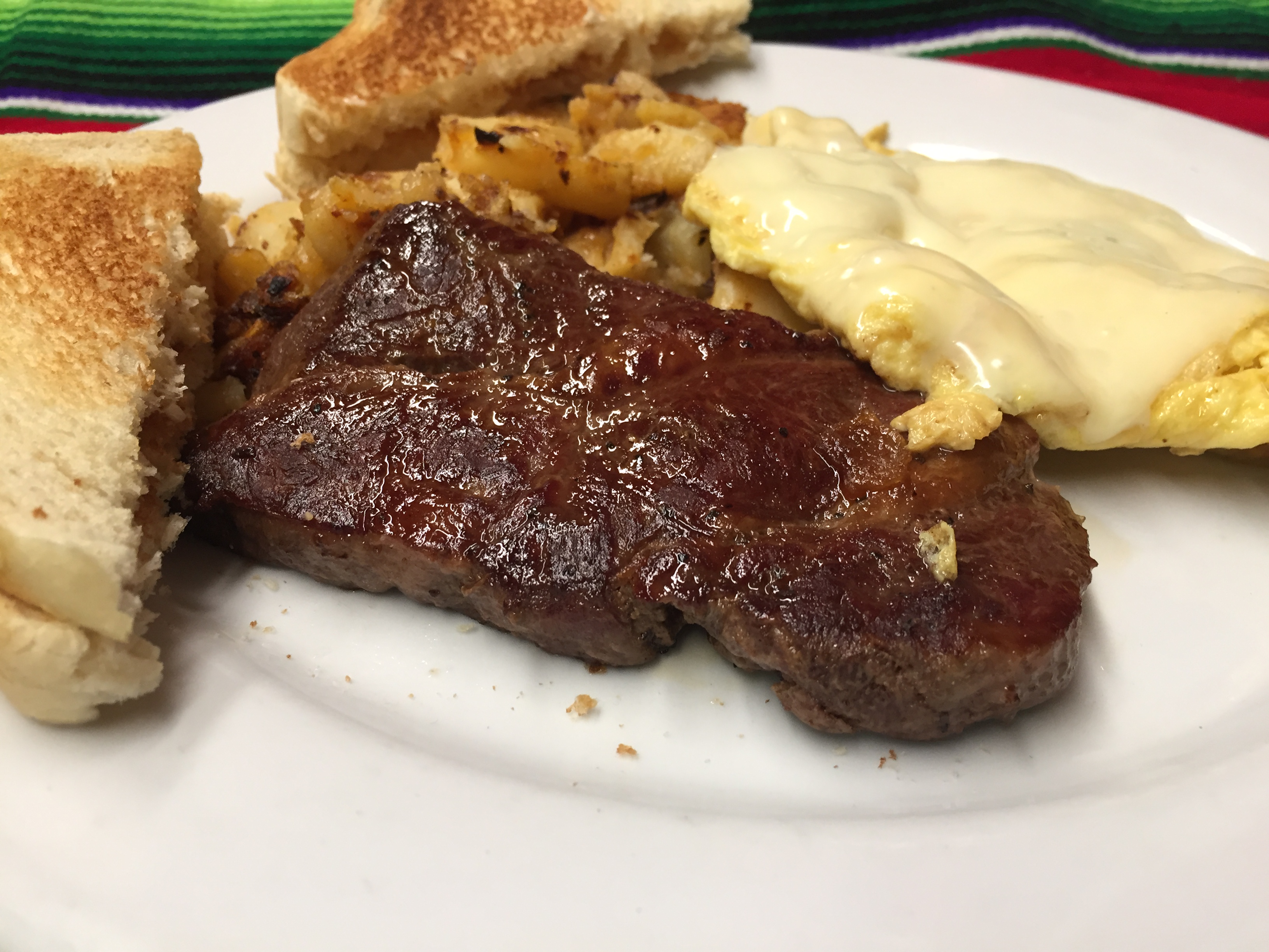Order STEAK AND EGGS  food online from Montes Cafe store, Seaside Heights on bringmethat.com