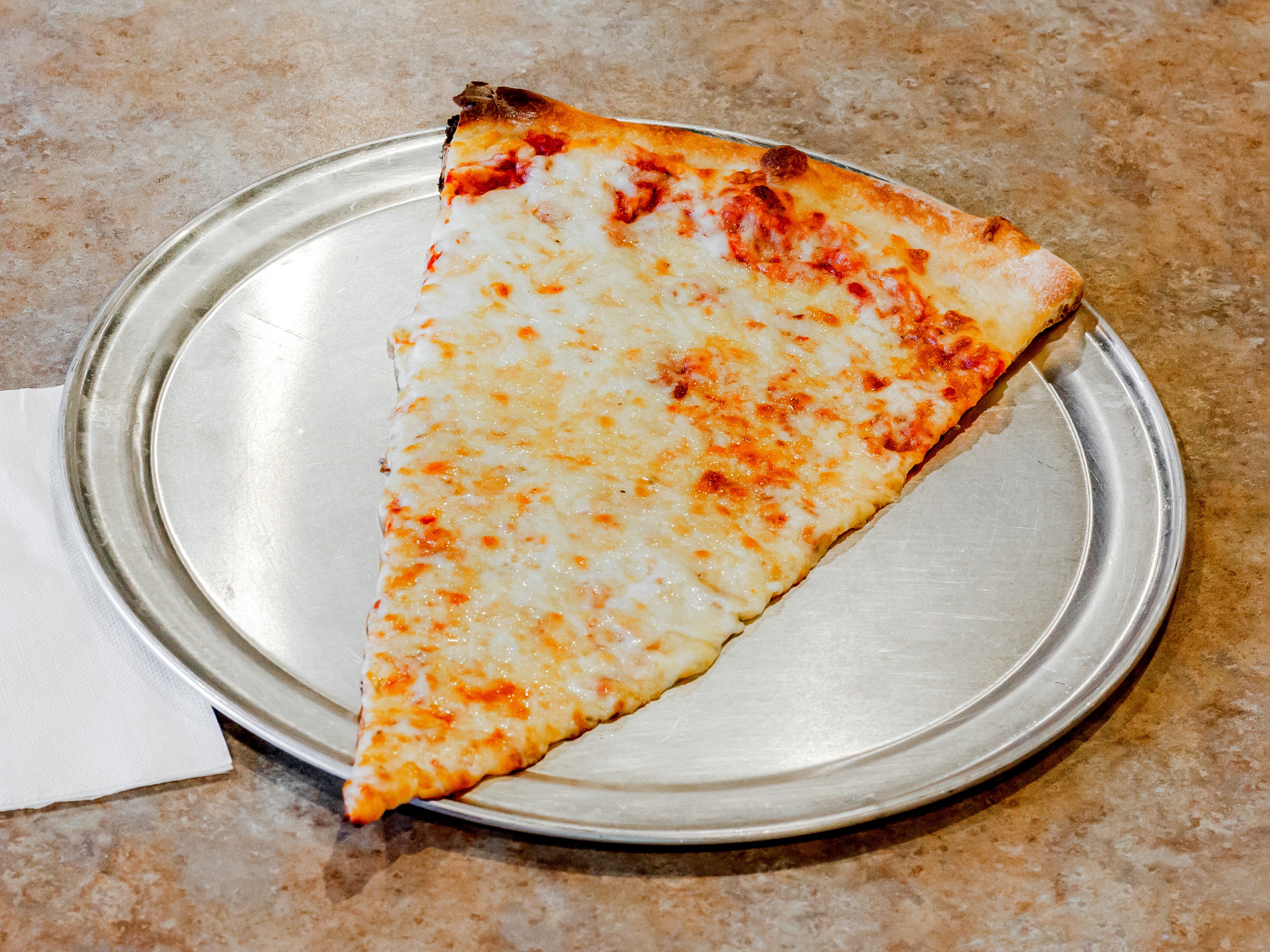 Order Cheese Pizza by the Slice food online from Tony's Pizza store, Jacksonville on bringmethat.com