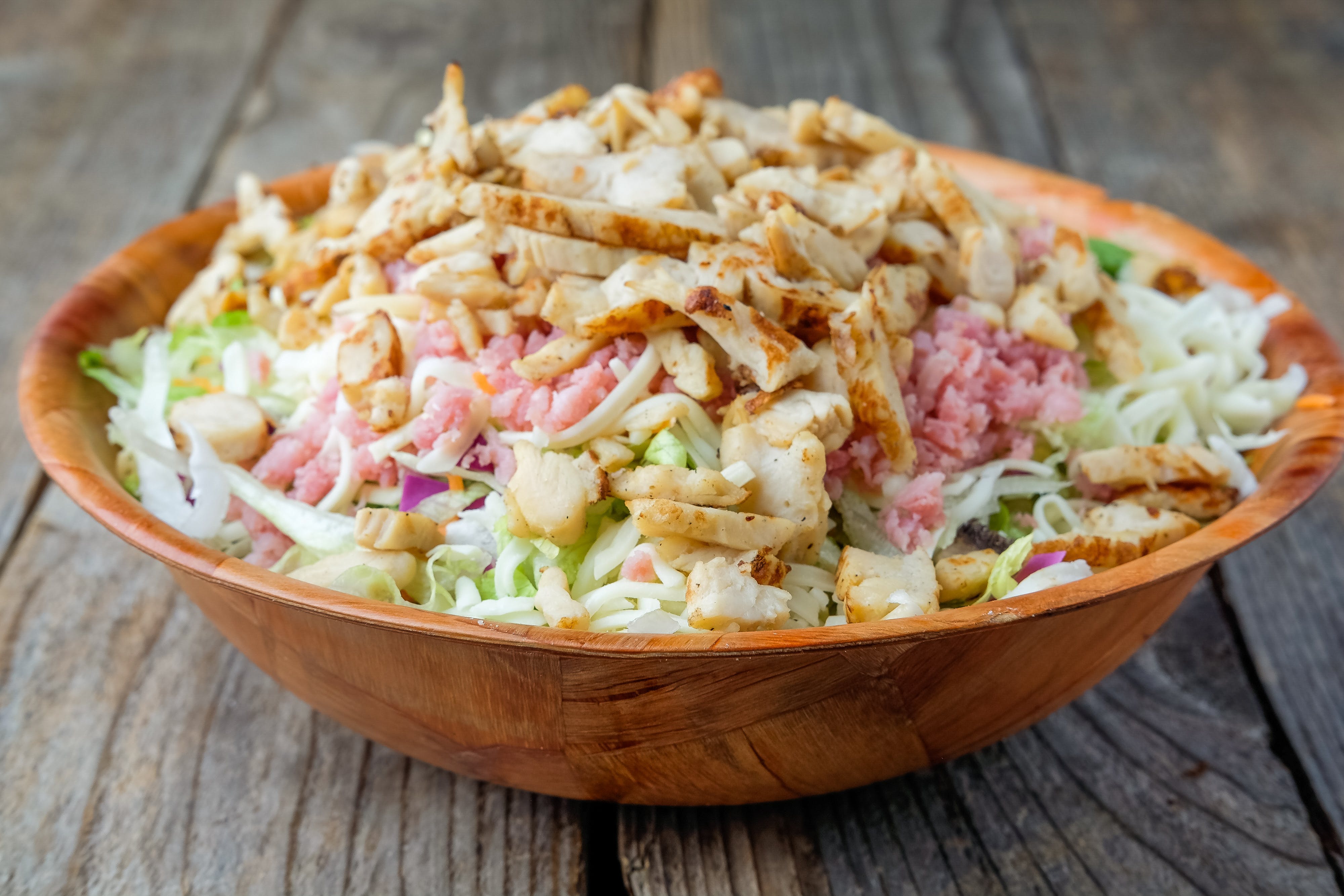 Order Chicken Breast Salad - Salad food online from Jim's Razorback Pizza store, Little Rock on bringmethat.com