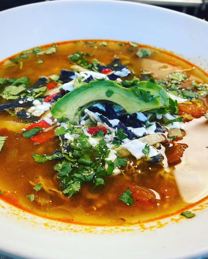 Order SCRATCH CHICKEN TORTILLA SOUP *( LUNCH PORTION )* food online from Tlc On The Lake store, Garland on bringmethat.com