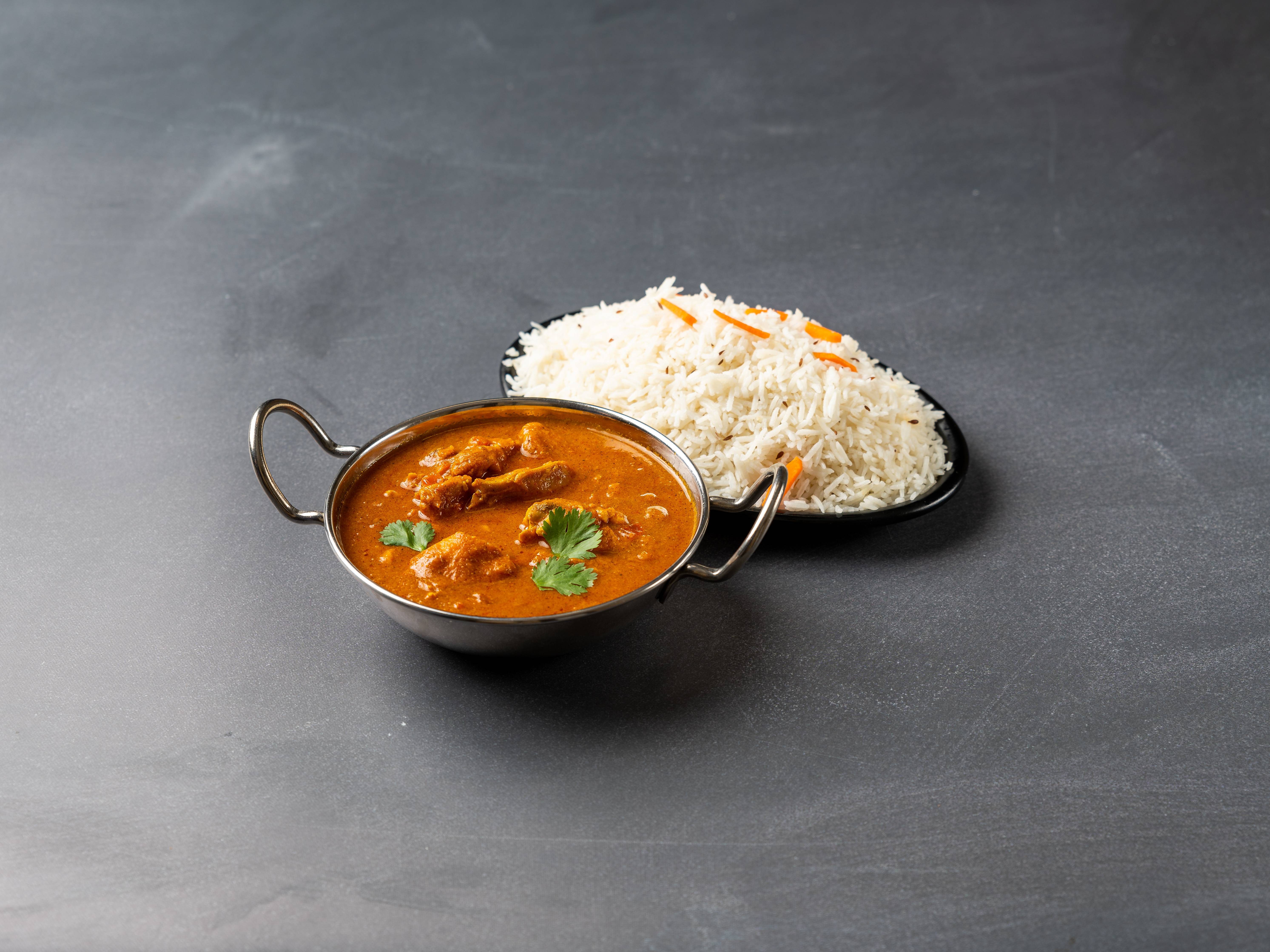 Order Chicken Curry food online from India Garden Restaurant store, Blacksburg on bringmethat.com