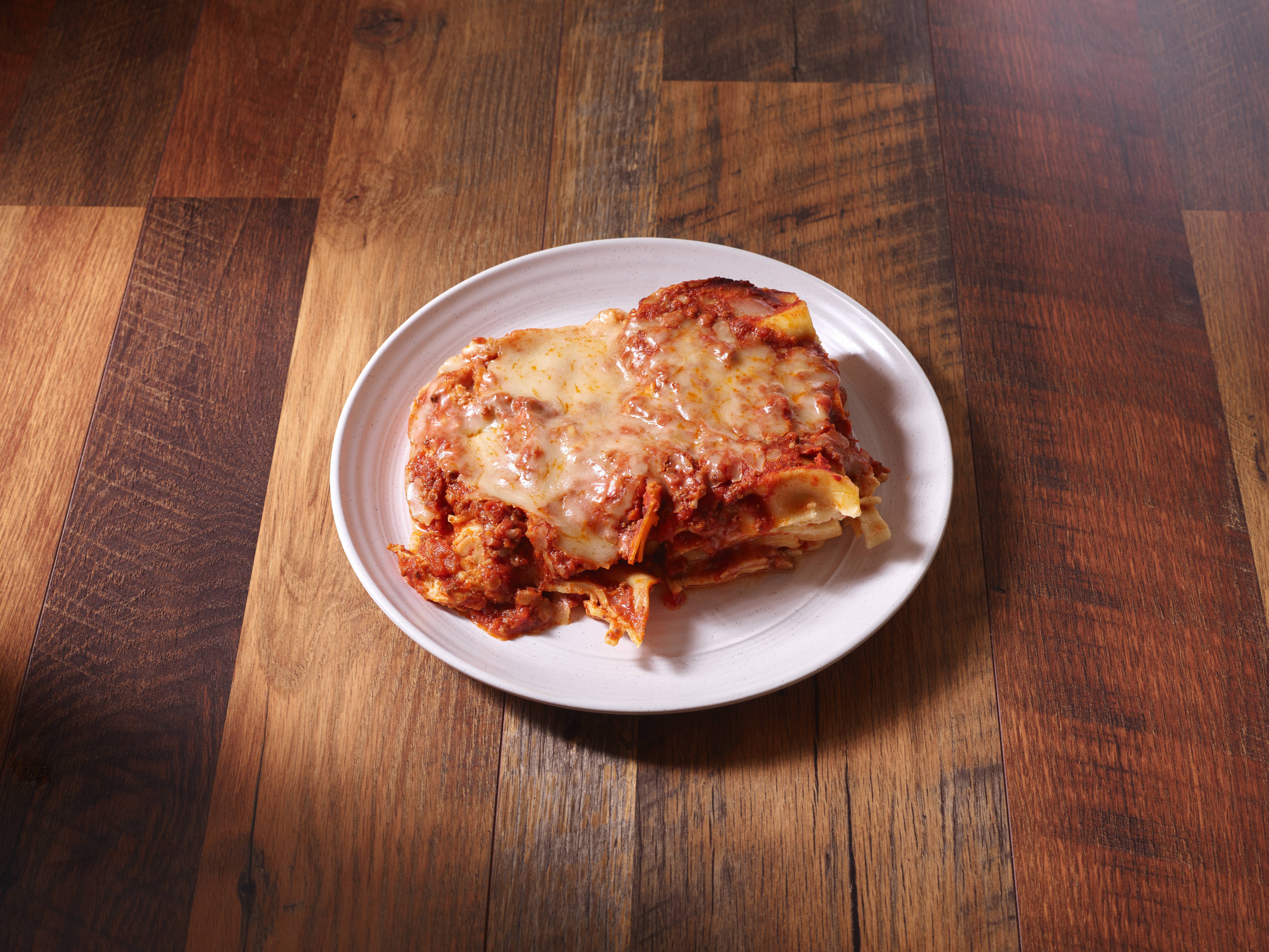 Order Lasagna food online from Bella Luna Ristorante store, Goodyear on bringmethat.com