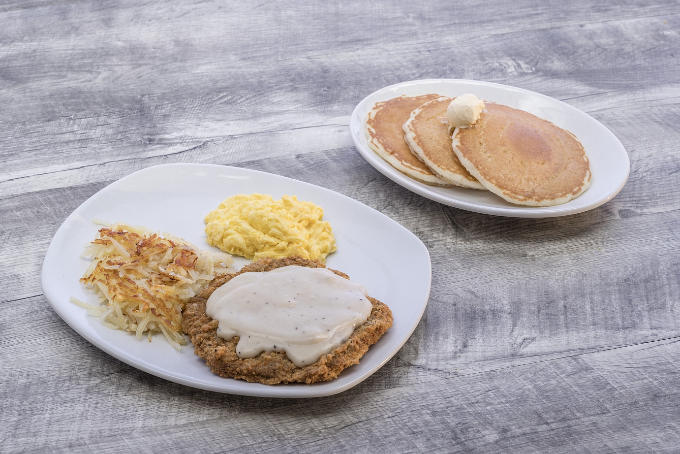 Order Country Fried Steak & Eggs food online from Perkins Restaurant 3842 store, Grand Forks on bringmethat.com