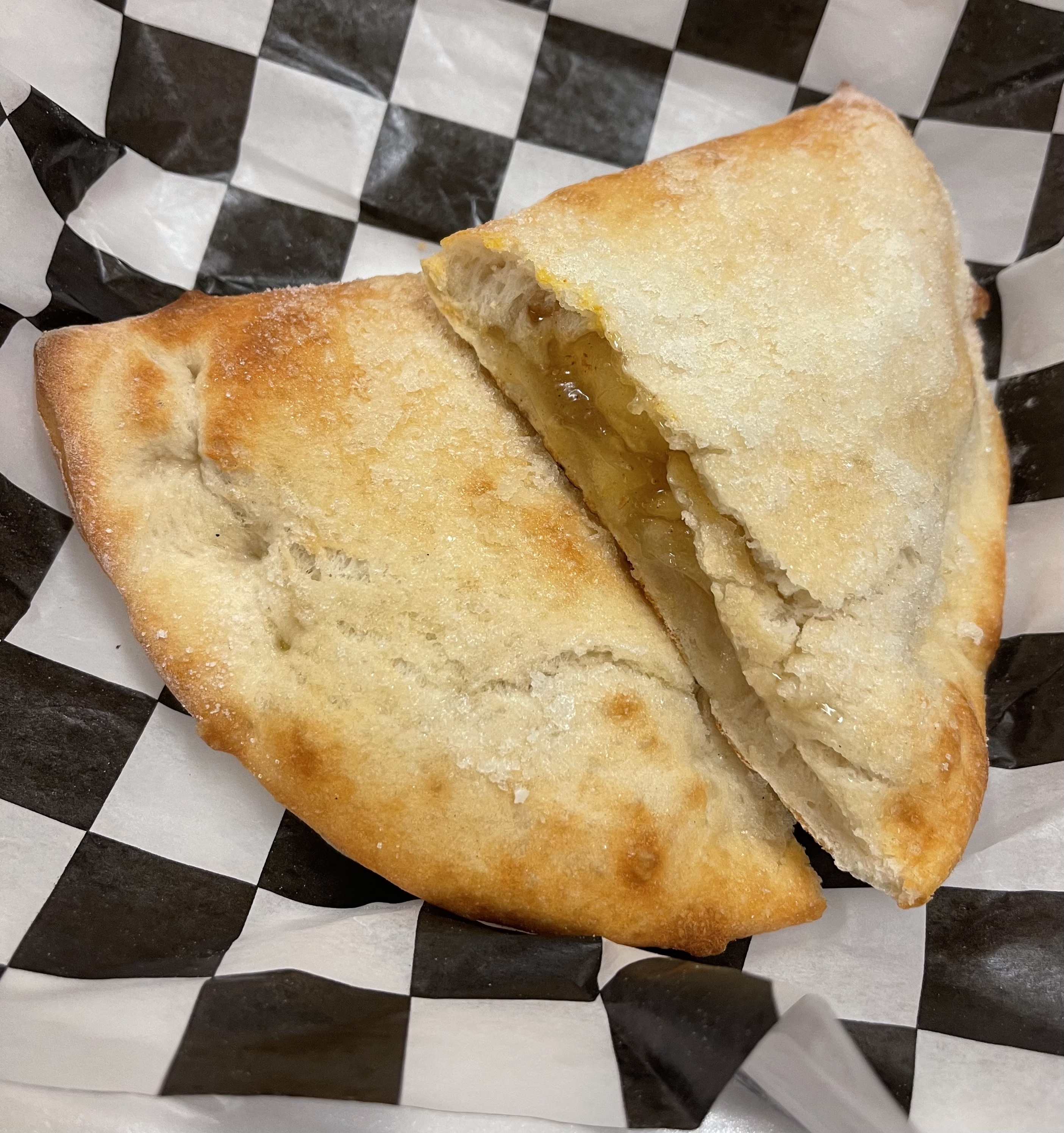 Order Apple pie calzone  food online from Rhino's Pizzeria store, Webster on bringmethat.com