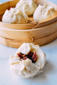 Order Steamed BBQ Pork Buns (3) food online from The Jade Garden store, Lawrence on bringmethat.com