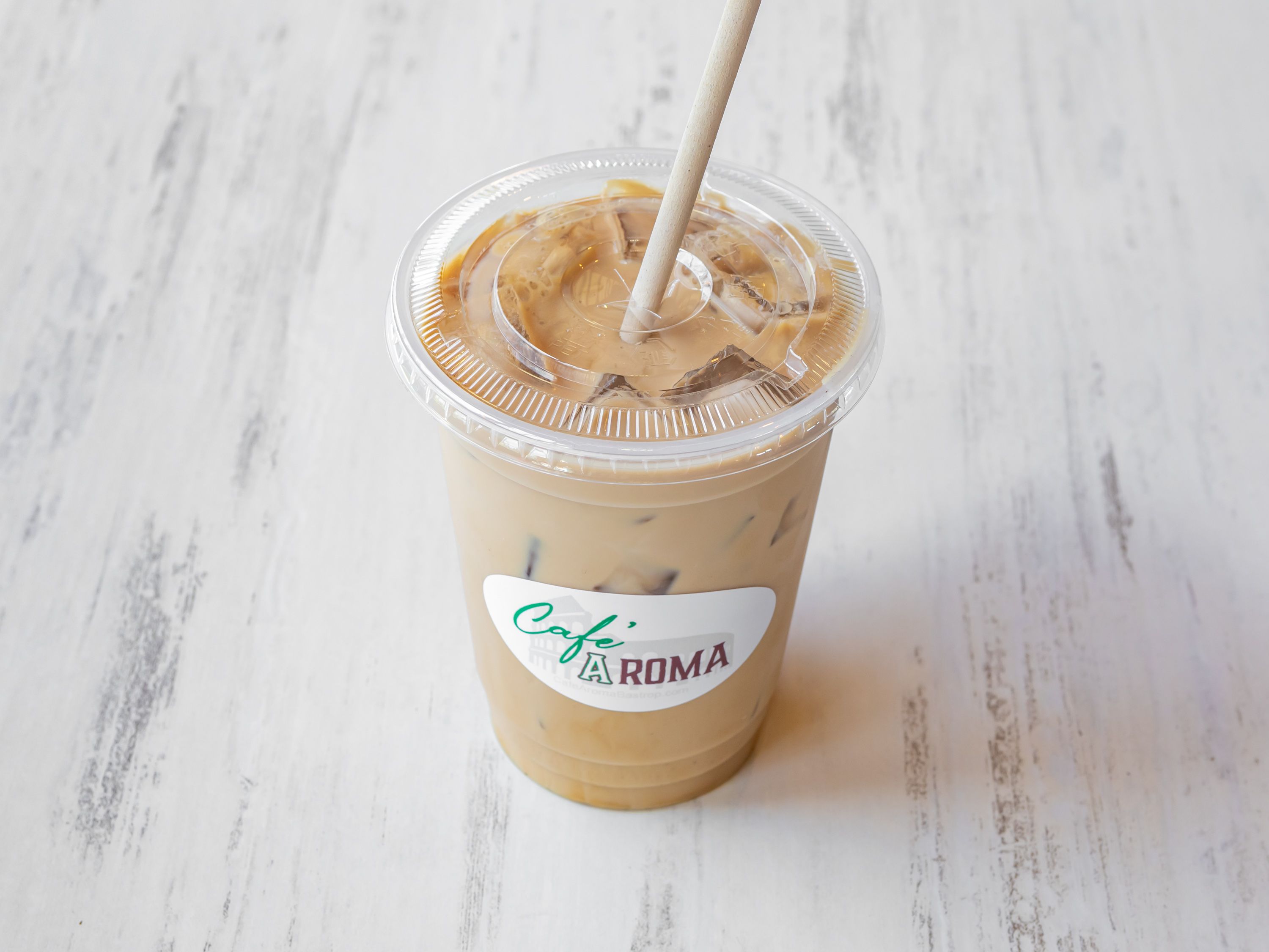 Order Iced Latte food online from Café Aroma store, Bastrop on bringmethat.com