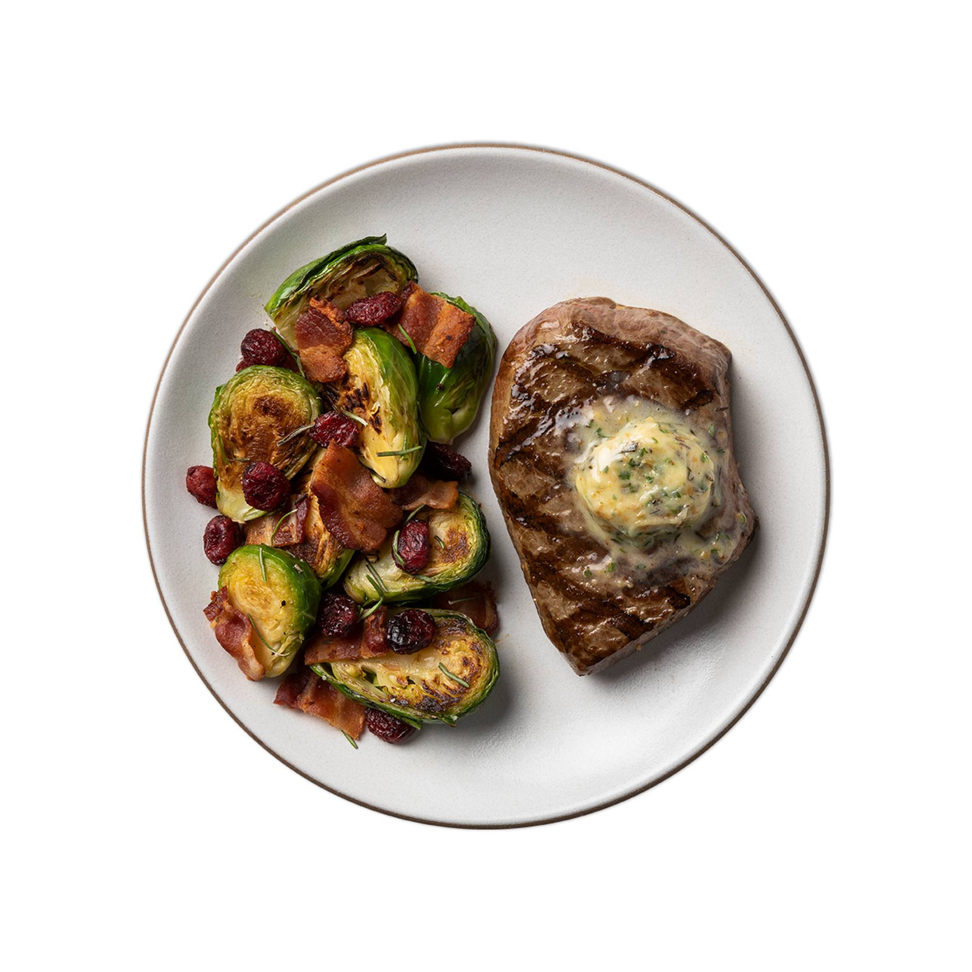 Order Herb Butter Steak with Bacon Roasted Brussels Sprouts food online from Snap Kitchen store, Dallas on bringmethat.com