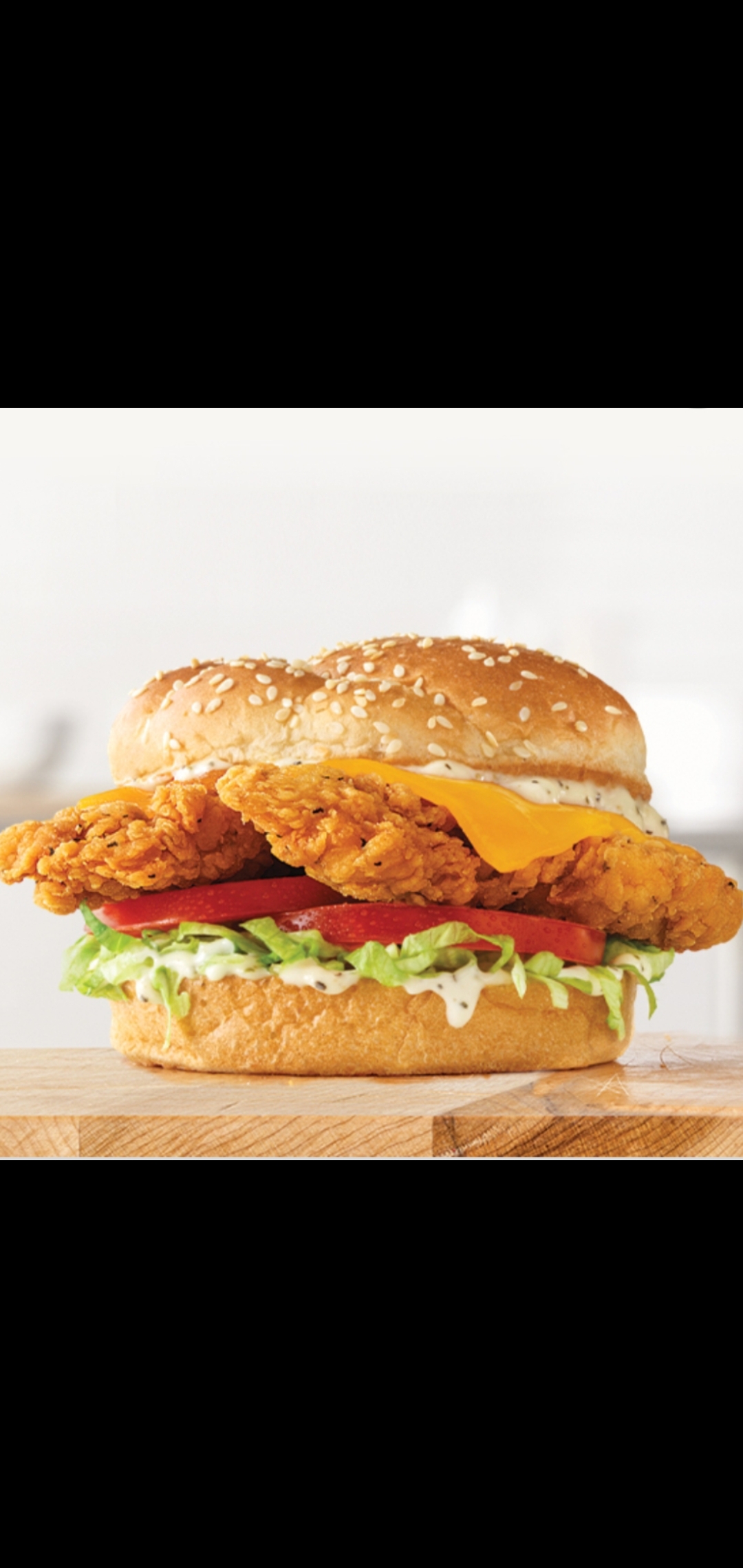 Order Crispy Spicy Chicken Vermont Cheddar Parmesan Cheese Lettuce Tomatoes & Ranch Dressing  food online from American Gourmet Foods Deli store, New York on bringmethat.com