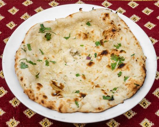 Order Garlic Naan (Side) food online from Curry In A Hurry store, Minneapolis on bringmethat.com