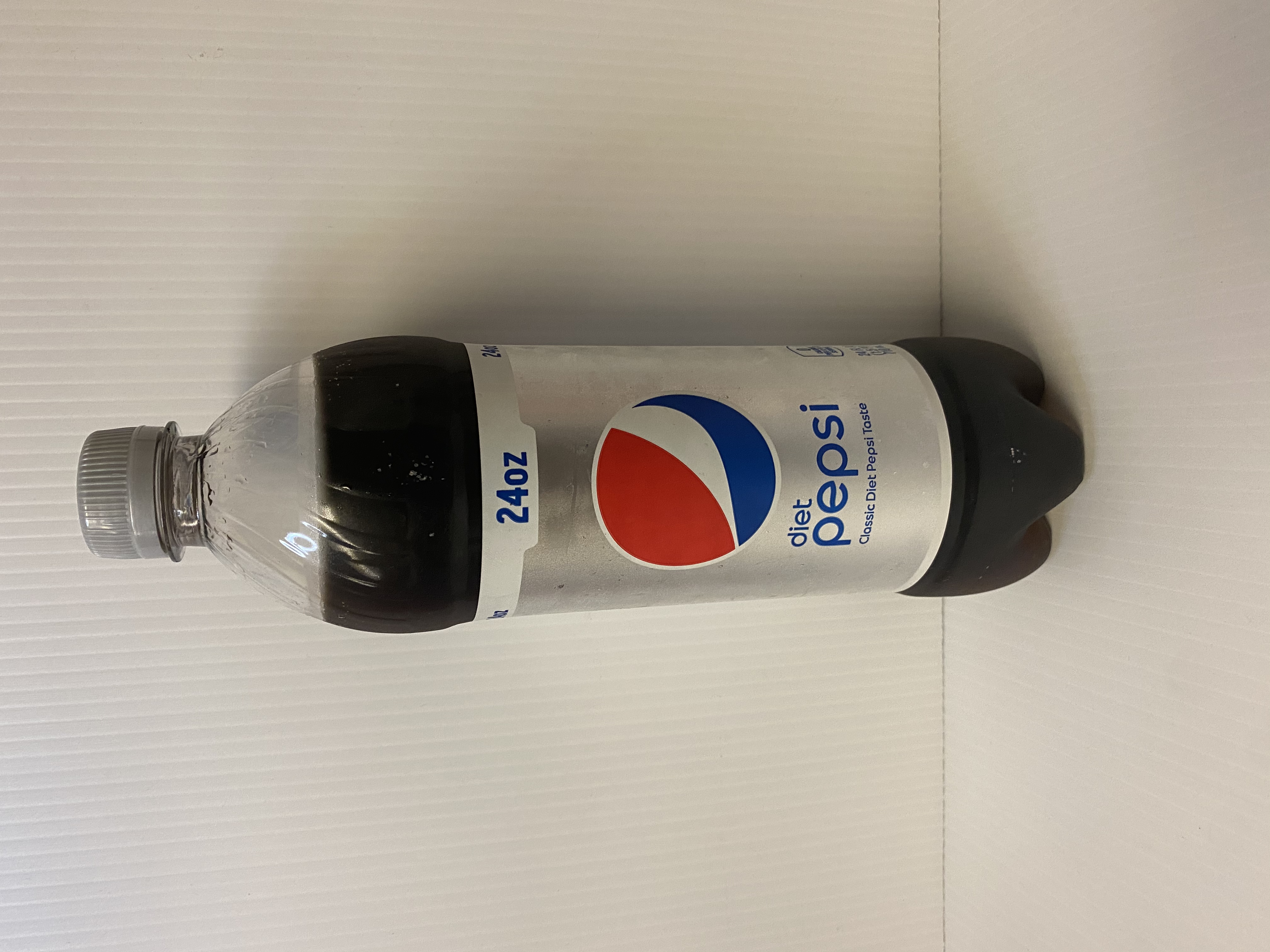 Order 24 oz. Diet Pepsi food online from Just Dash It store, Englewood on bringmethat.com
