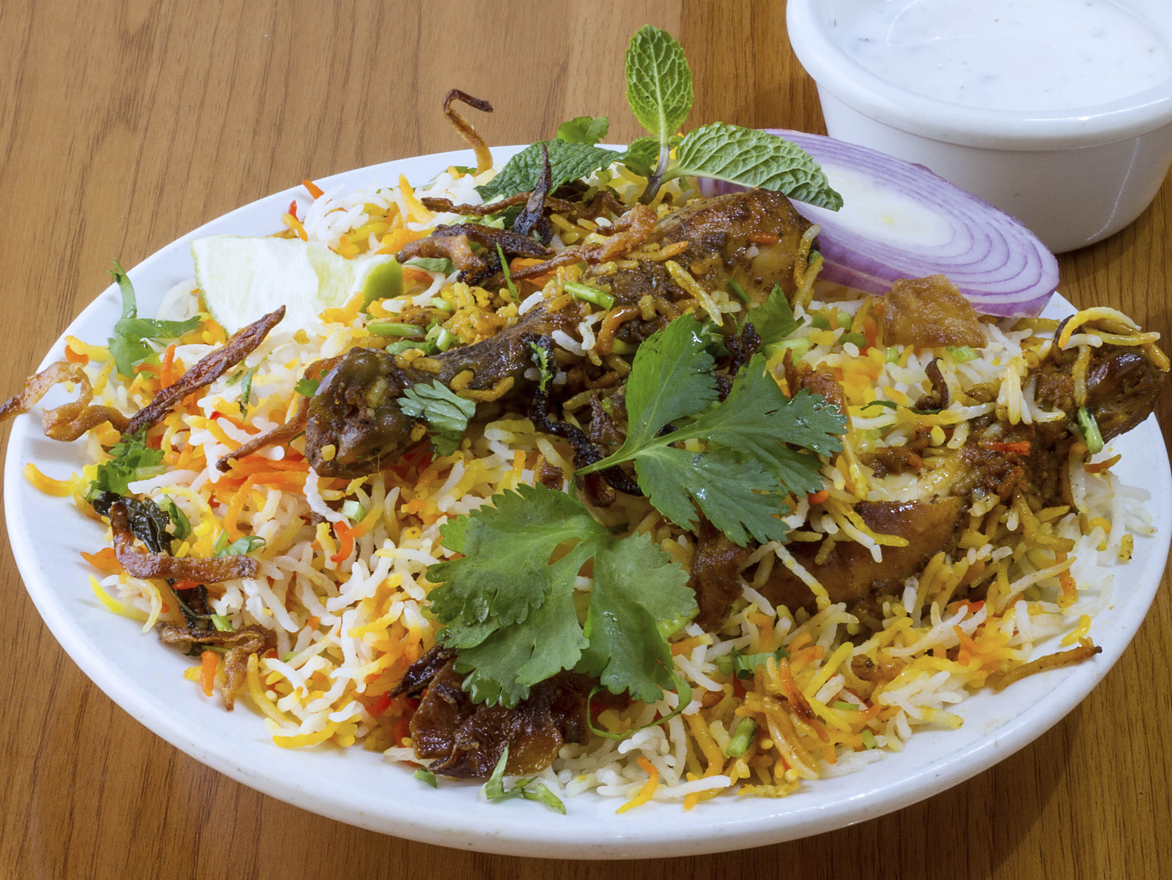Order Hyderabadi Chicken Dum Biryani food online from Spice Fine Indian Cuisine store, Austin on bringmethat.com