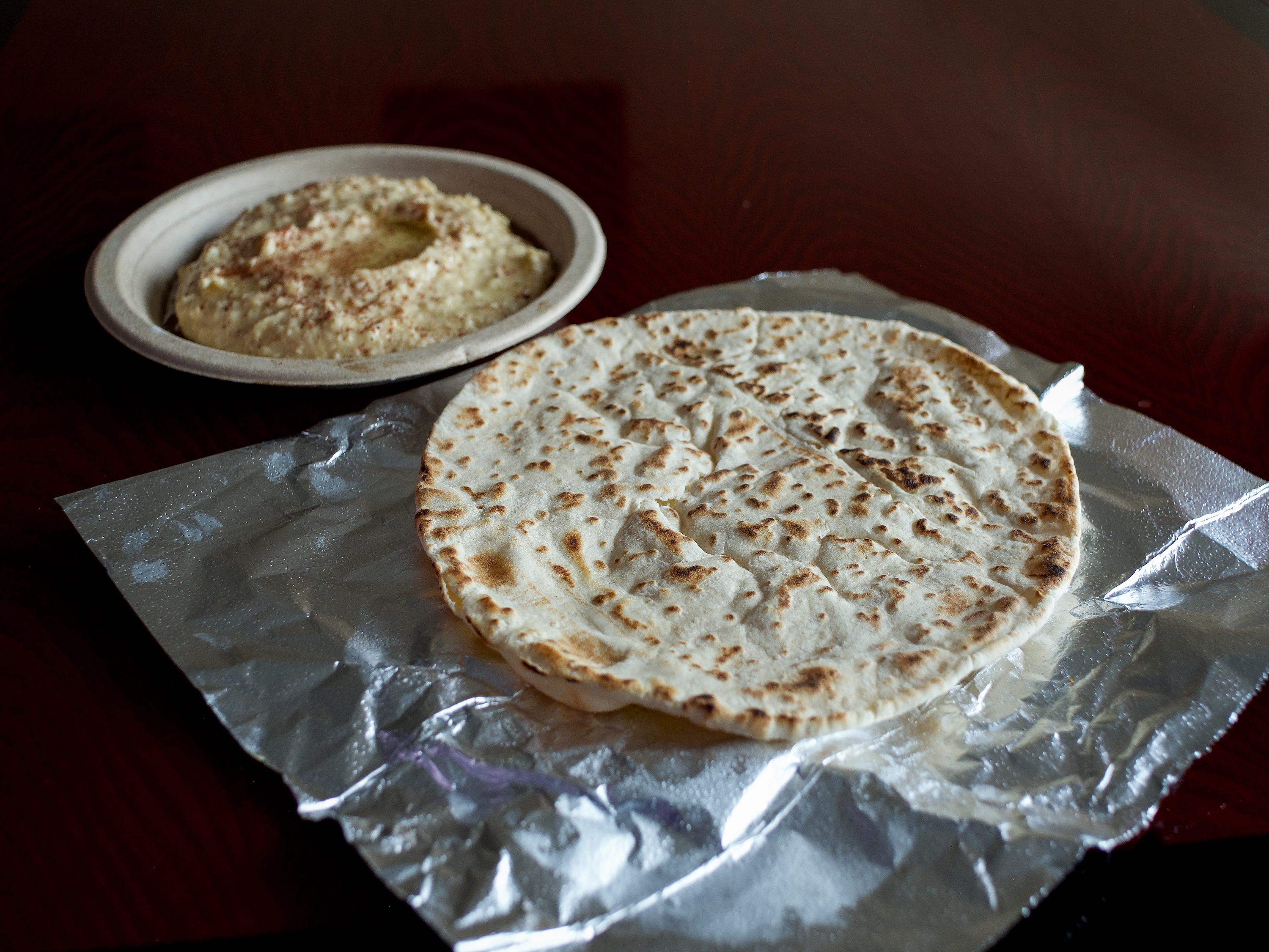 Order Hummus with Pita Bread food online from Sams Kebab & Gyros store, Concord on bringmethat.com