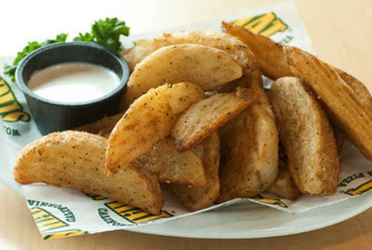 Order Seasoned Potato Wedges food online from Straw Hat Pizza store, Chino on bringmethat.com