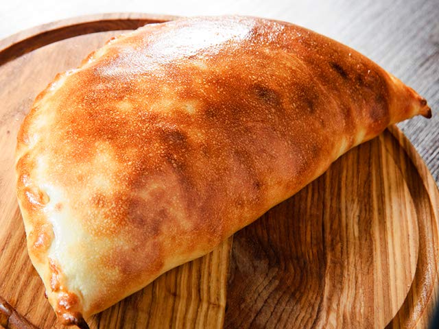 Order Spinach Florentine Calzone food online from Napoli's Pizza store, Virginia Beach on bringmethat.com