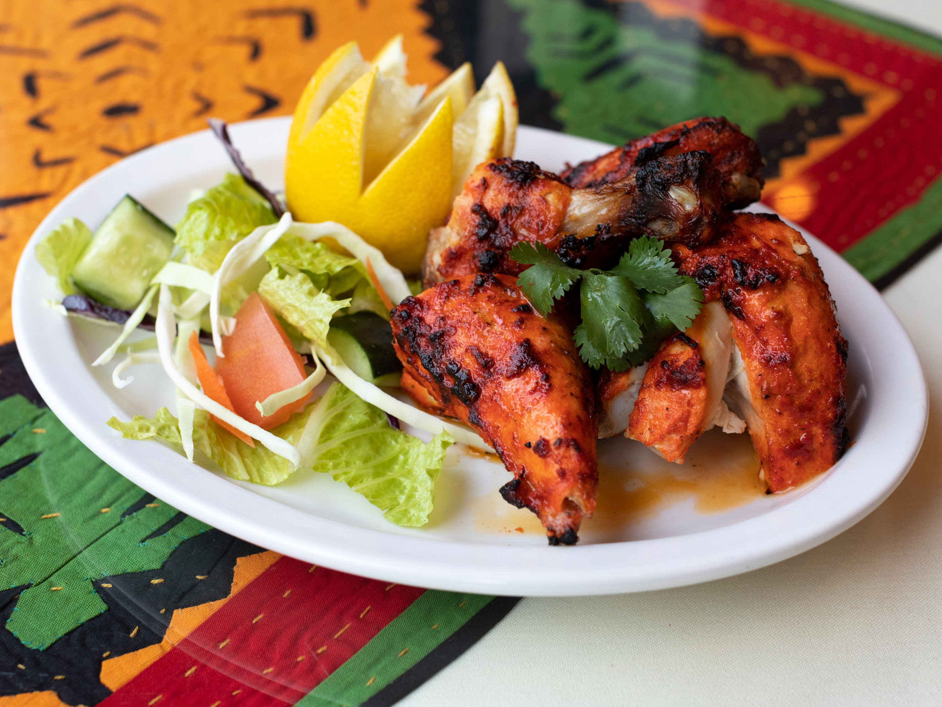 Order Tandoori Chicken food online from Shalimar Restaurant store, Ann Arbor on bringmethat.com