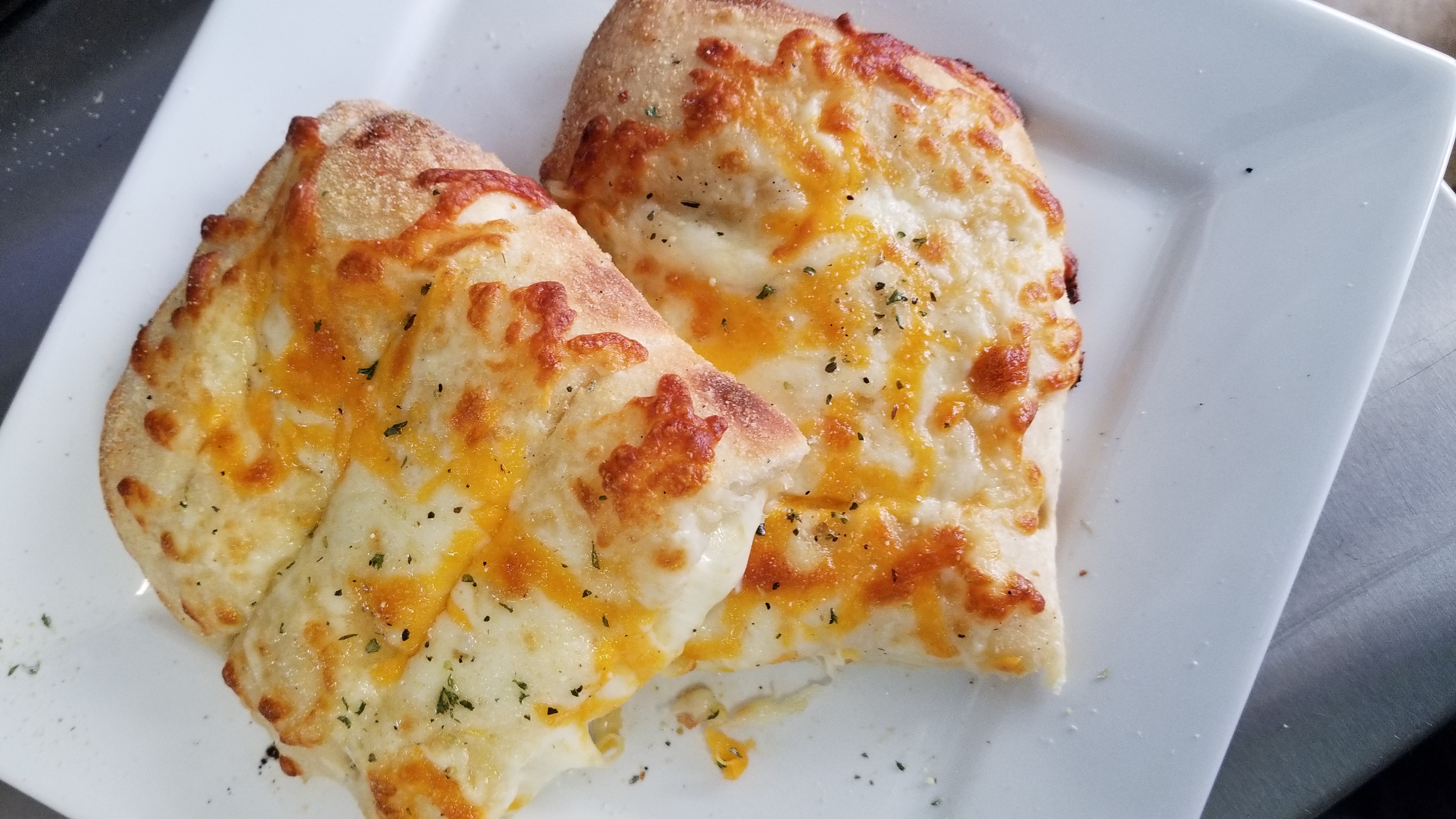 Order Stuffed Cheesy Bread Sticks food online from Papa Ray's Pizza store, Daly City on bringmethat.com