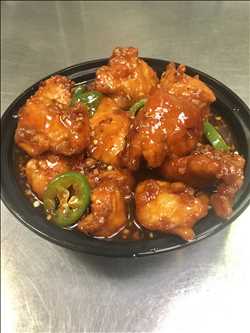Order General Tso's Chicken food online from Wok One store, Meadows Place on bringmethat.com