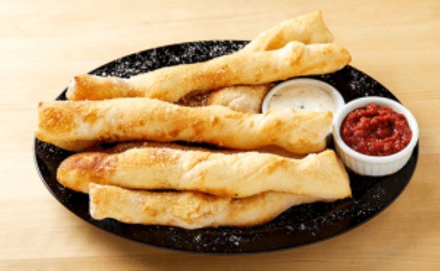 Order Twisted Breadstix - Twisted Breadstix food online from Pizza Factory store, Gilroy on bringmethat.com
