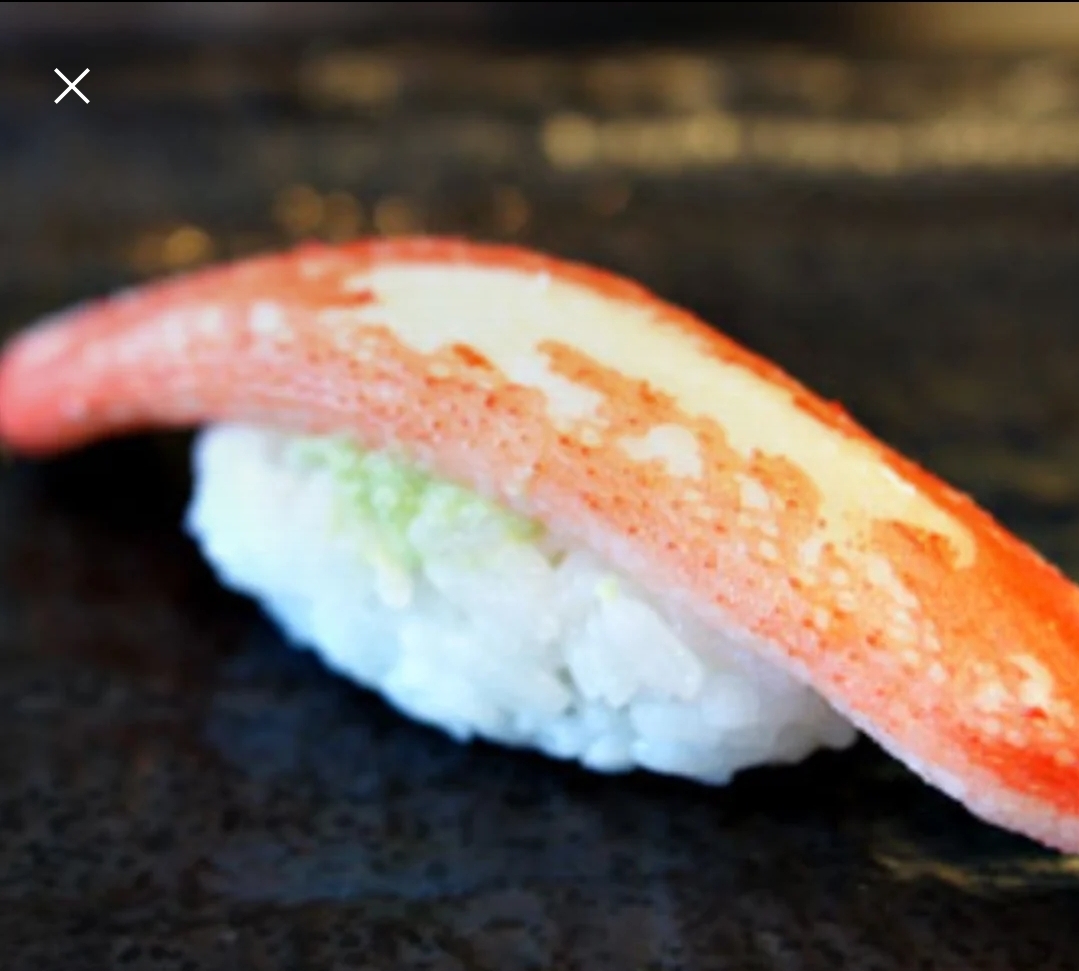 Order Alaskan Snow Crab Nigiri  food online from Taki Japanese Steakhouse store, Atlanta on bringmethat.com