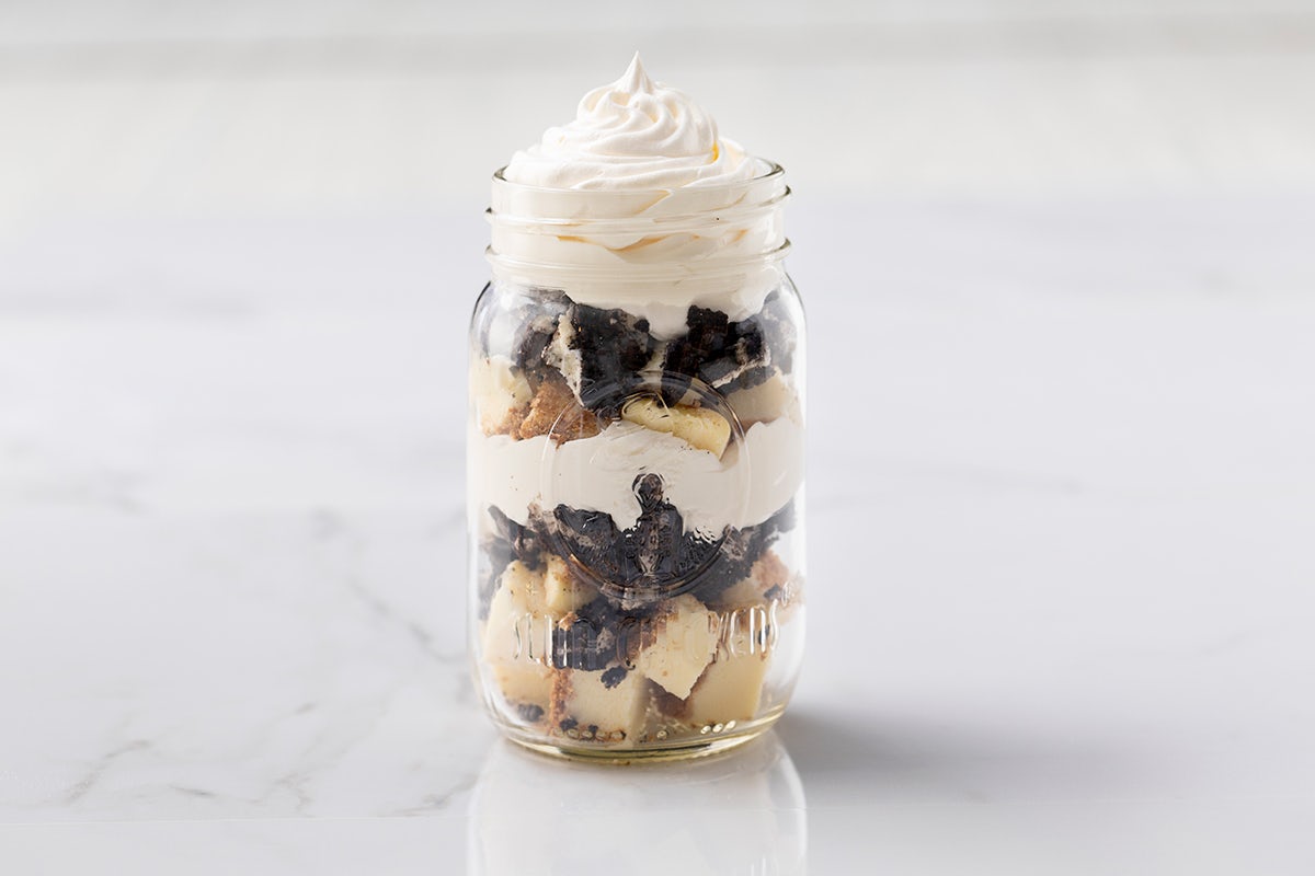 Order OREO® Cheesecake Jar Dessert food online from Slim Chickens store, Independence on bringmethat.com