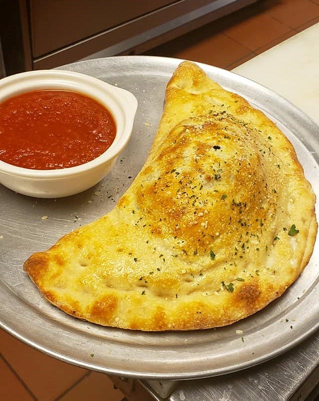 Order Calzone - Small food online from Pizza Village Tomato Pie store, Lahaska on bringmethat.com