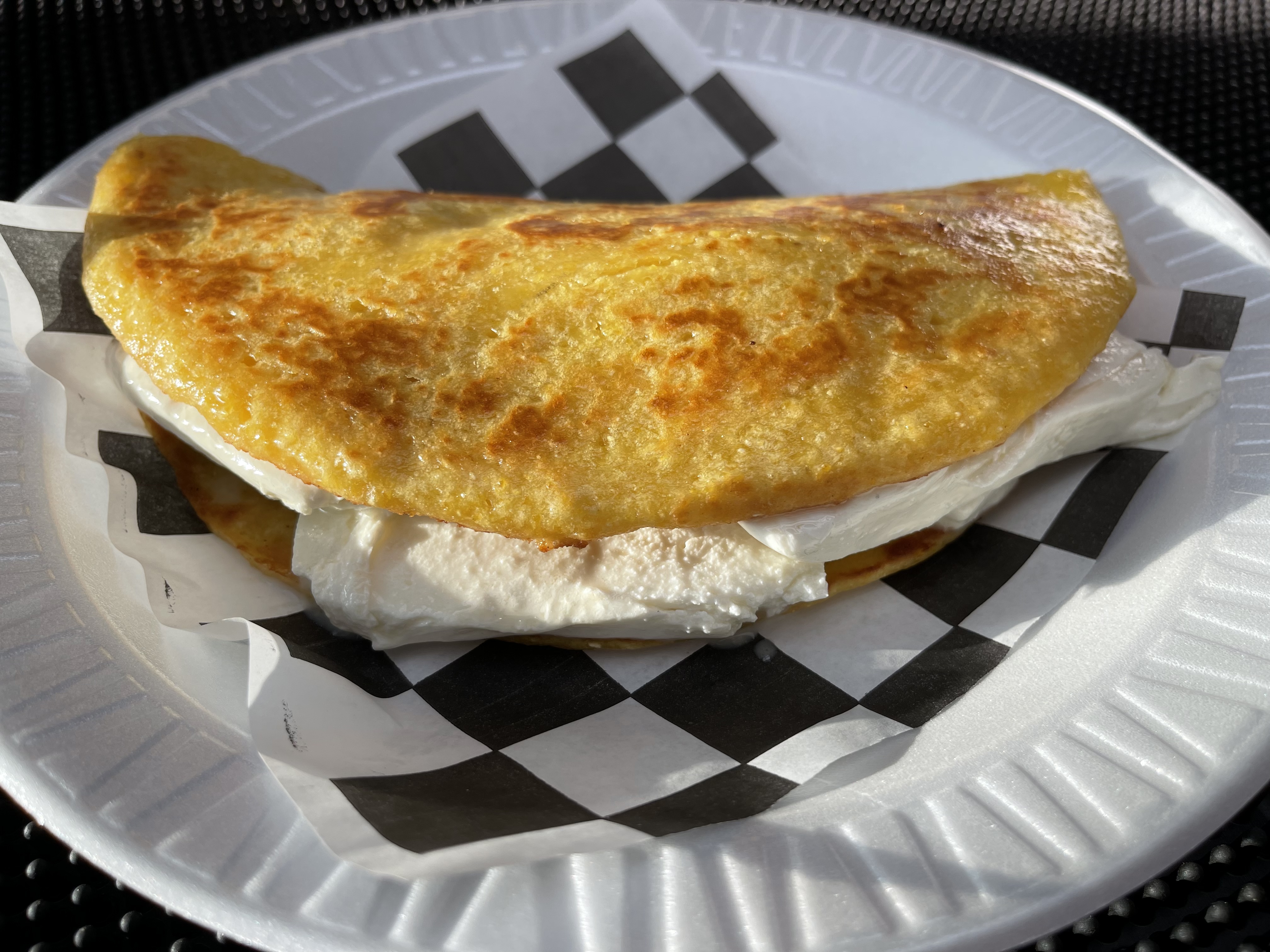Order Cachapa Queso food online from Arepas Cafe Li store, North Merrick on bringmethat.com