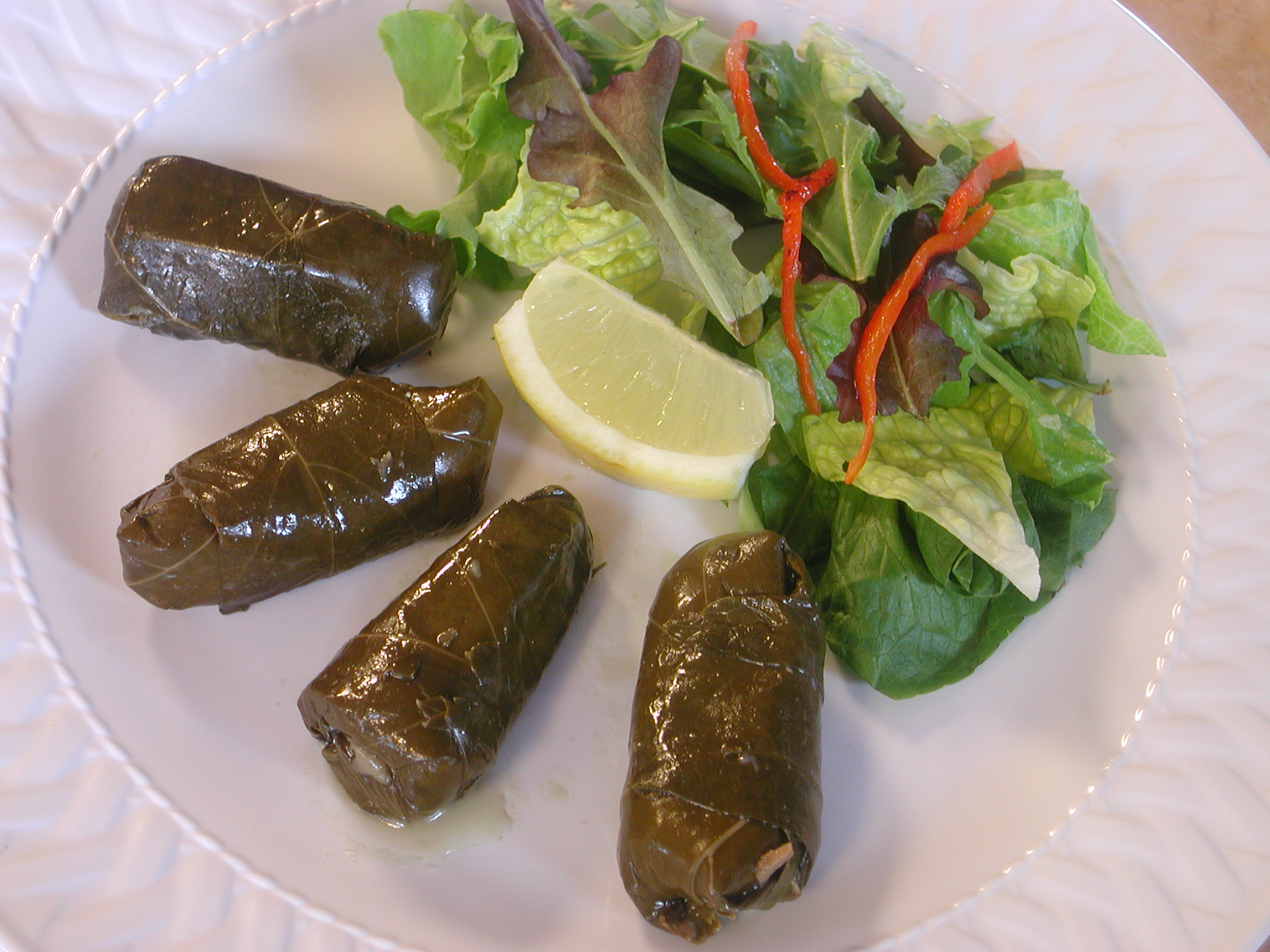 Order Stuffed Grape Leaves food online from Sorrento Grill store, Herndon on bringmethat.com