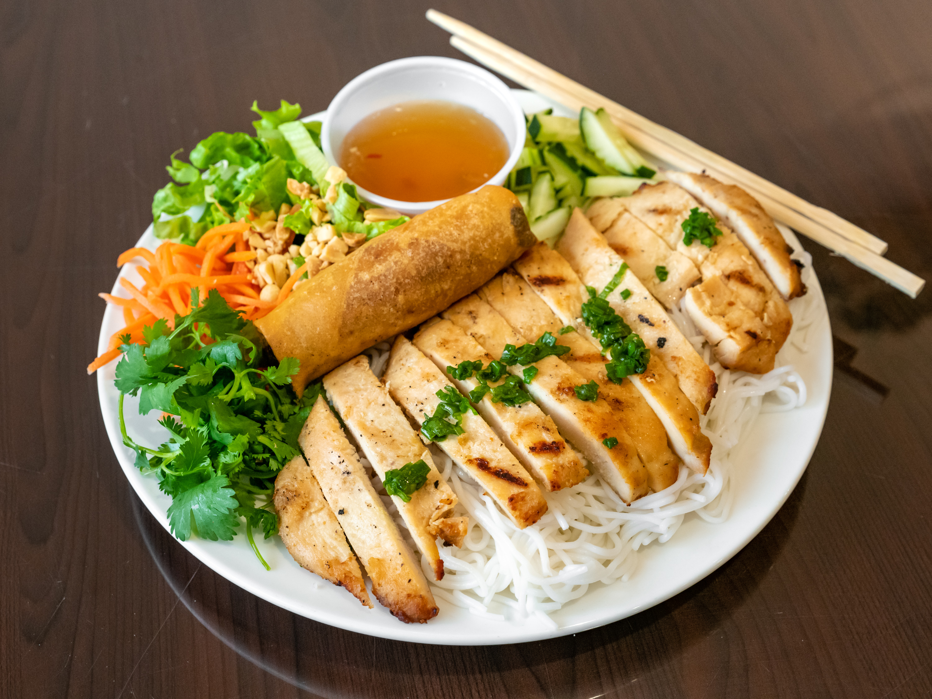 Order Grilled Chicken and Eggroll Vermicelli Salad food online from Banh Mi Viet store, Fort Worth on bringmethat.com