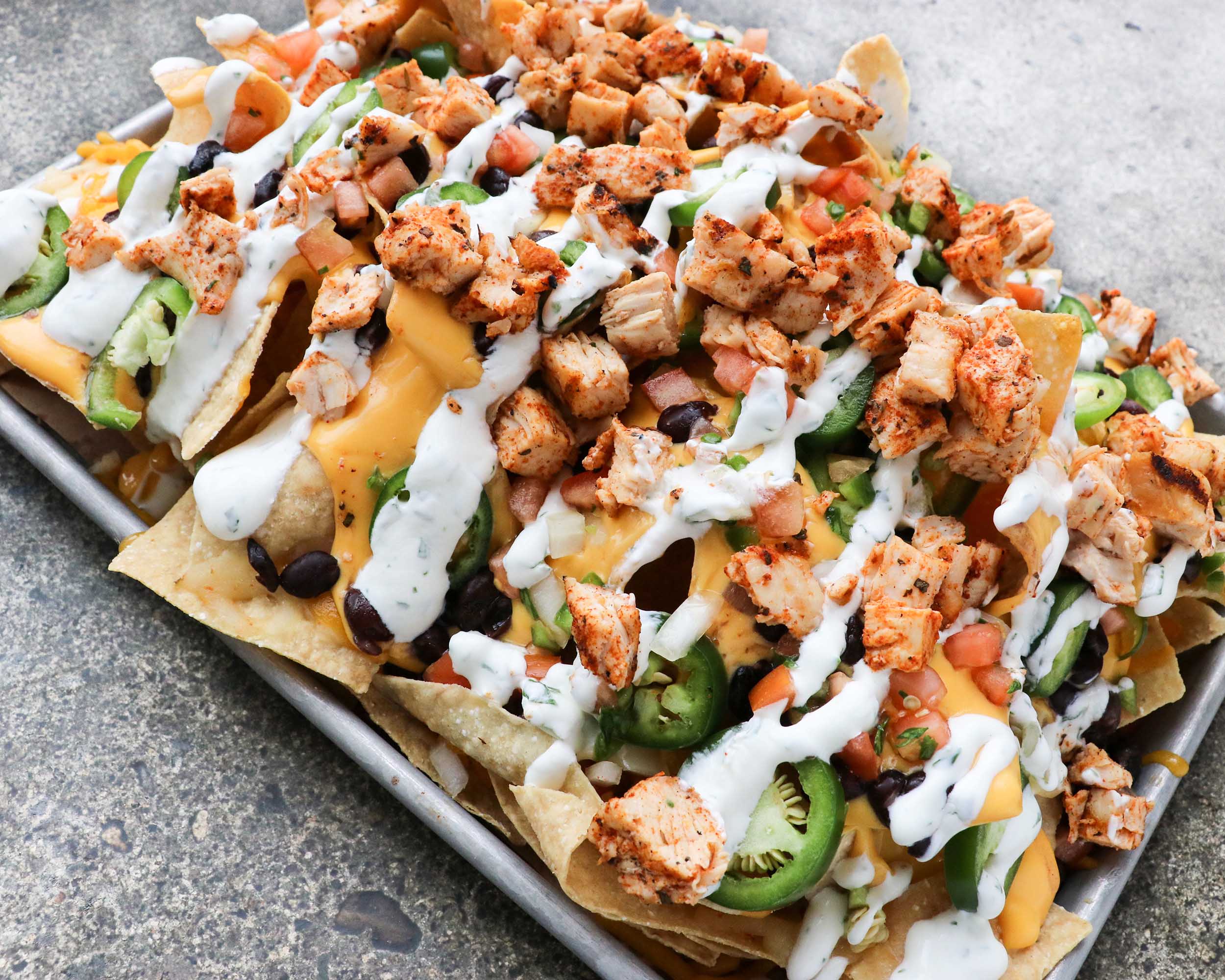 Order Macho Nachos food online from Scotty's brewhouse store, Bloomington on bringmethat.com