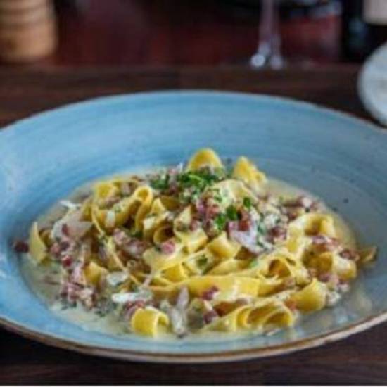 Order Pappardelle Carbonara food online from New York Pizzeria store, Houston on bringmethat.com