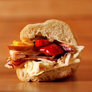 Order #13. Turkey, Ham and Wasabi Coleslaw food online from Pane Pane Sandwiches store, Seattle on bringmethat.com