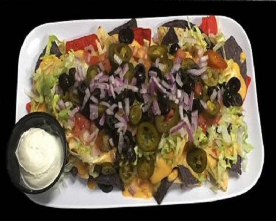 Order Ultimate Nachos food online from Paninis Bar & Grill store, Stow on bringmethat.com