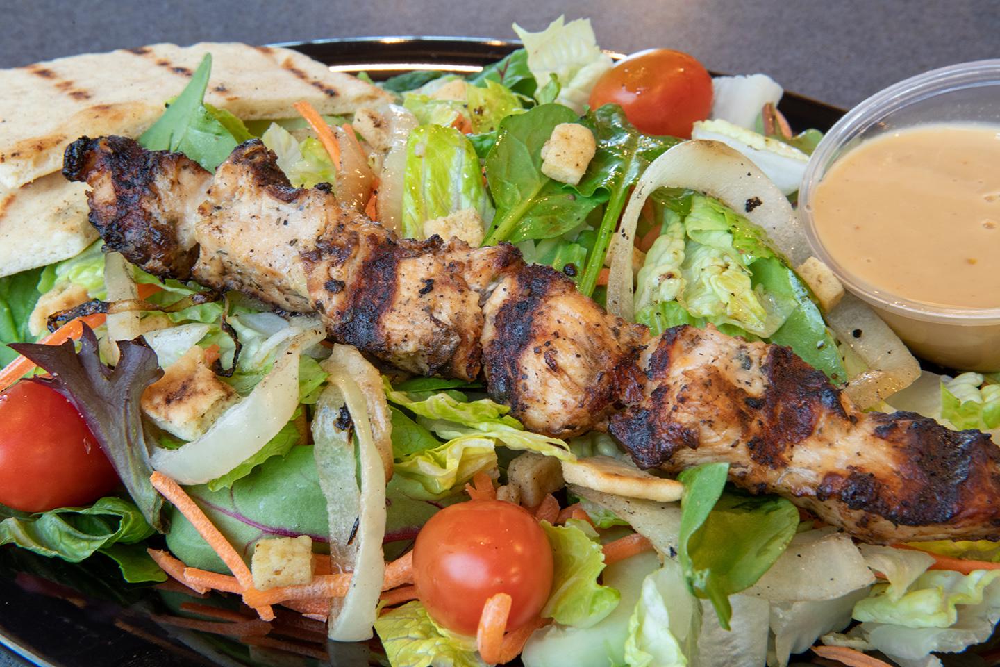 Order Salad - Chicken food online from Sticks Kebob Shop store, Charlottesville on bringmethat.com