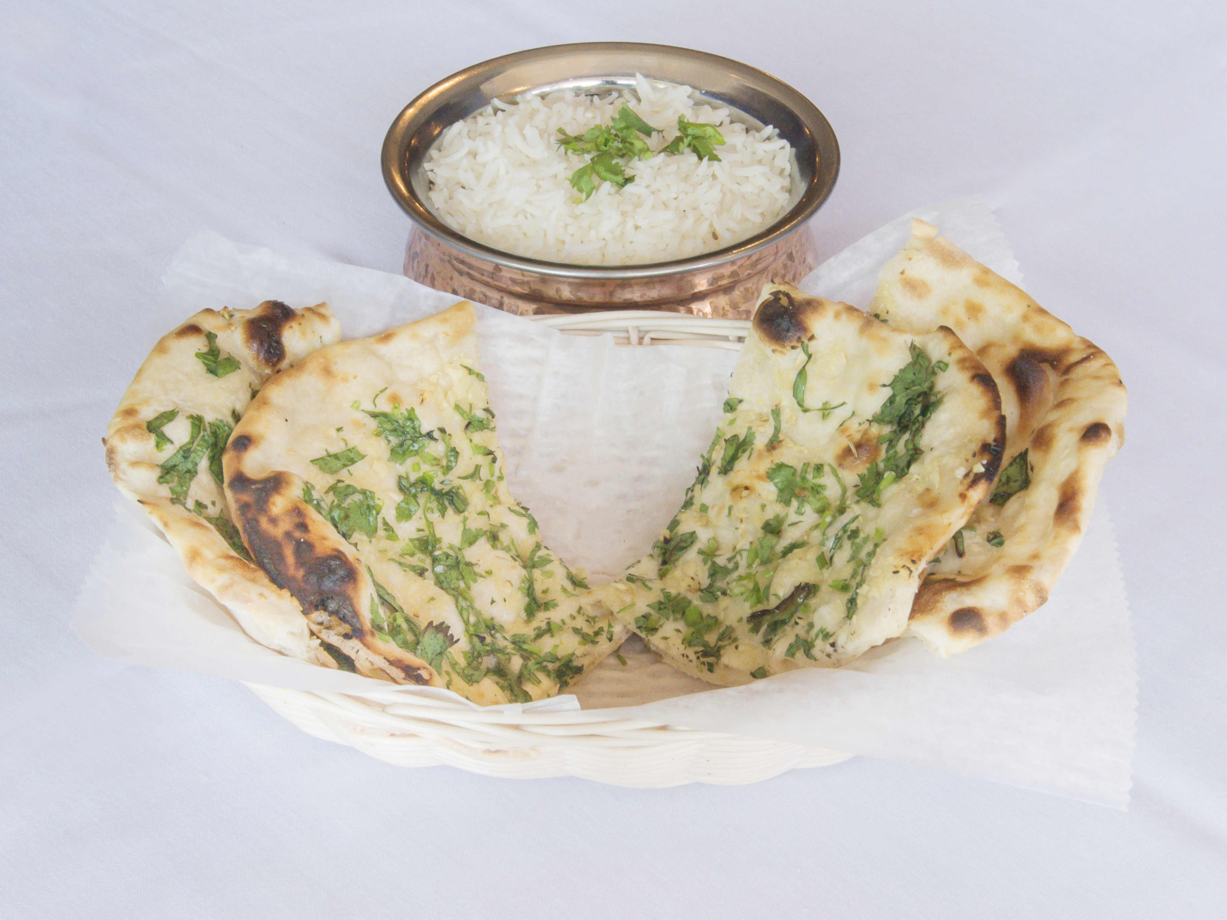 Order Garlic Naan food online from Bombay River store, Red Bank on bringmethat.com