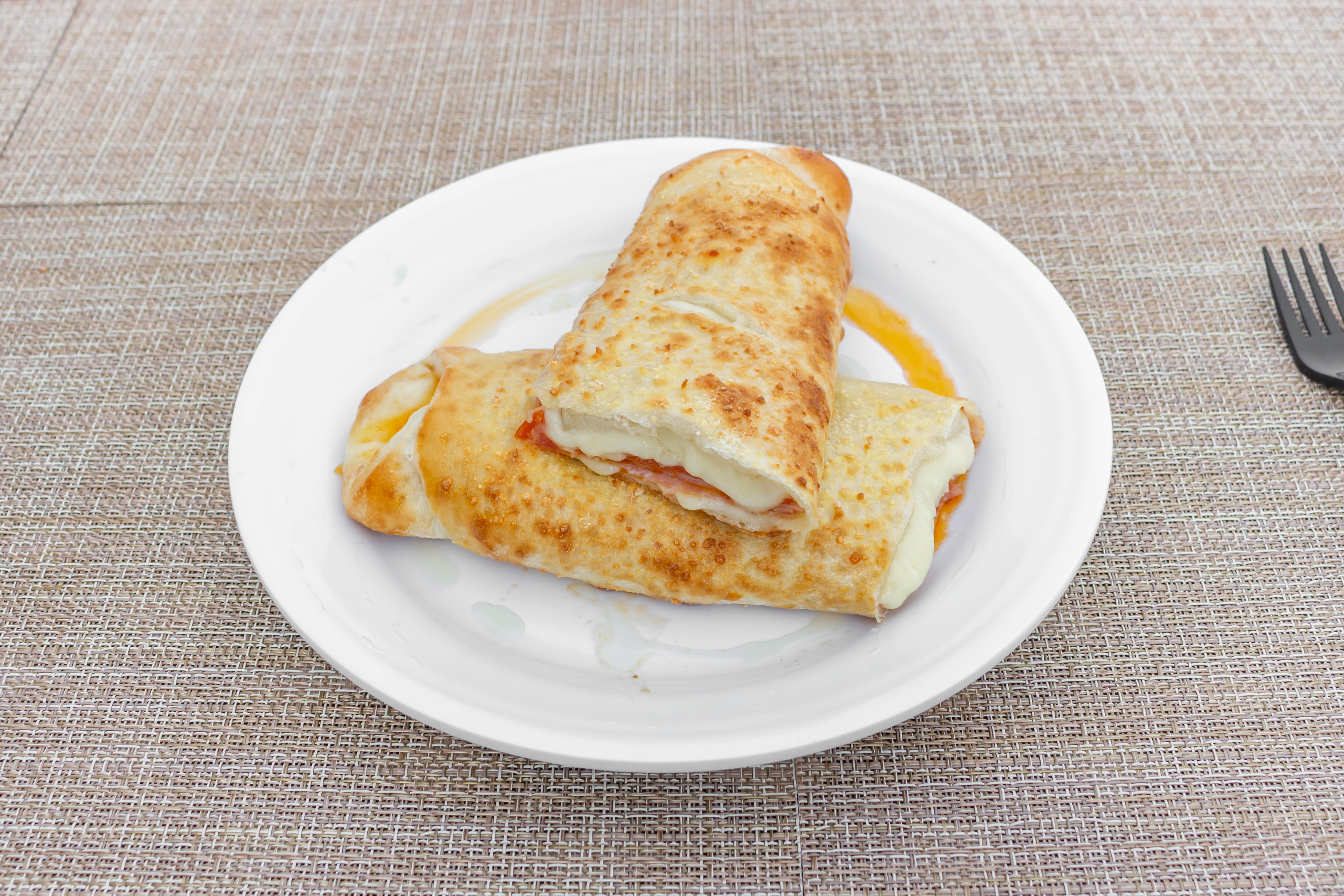 Order Traditional Stromboli - Stromboli food online from Natale's Pizzeria & Catering store, Waldwick on bringmethat.com