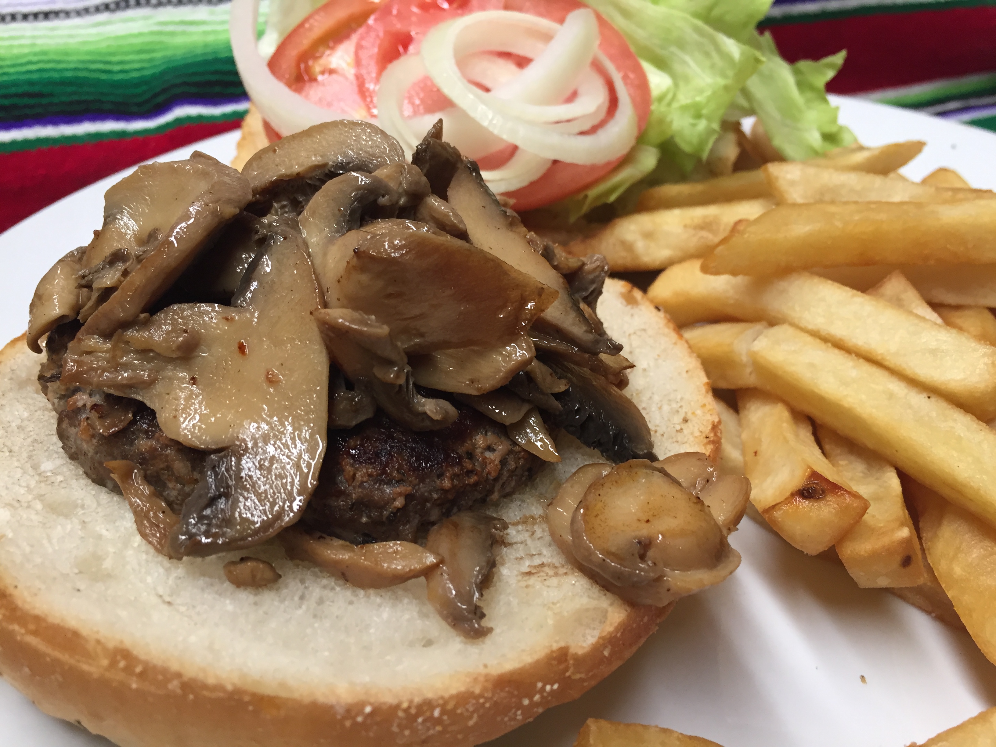 Order MUSHROOM AND PROVOLONE CHEESE  BURGER  food online from Montes Cafe store, Seaside Heights on bringmethat.com