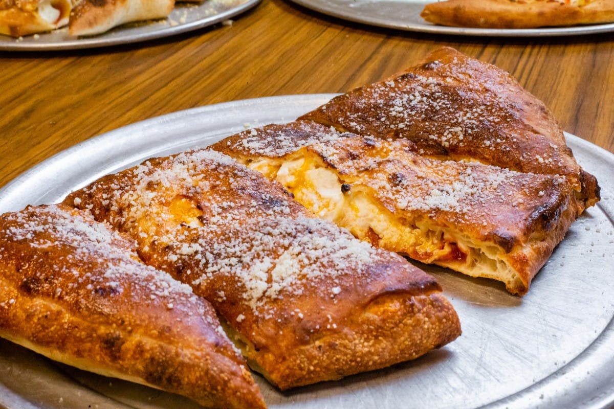 Order Calzone with Two Toppings - Small food online from Pisanello Pizza store, Waterville on bringmethat.com
