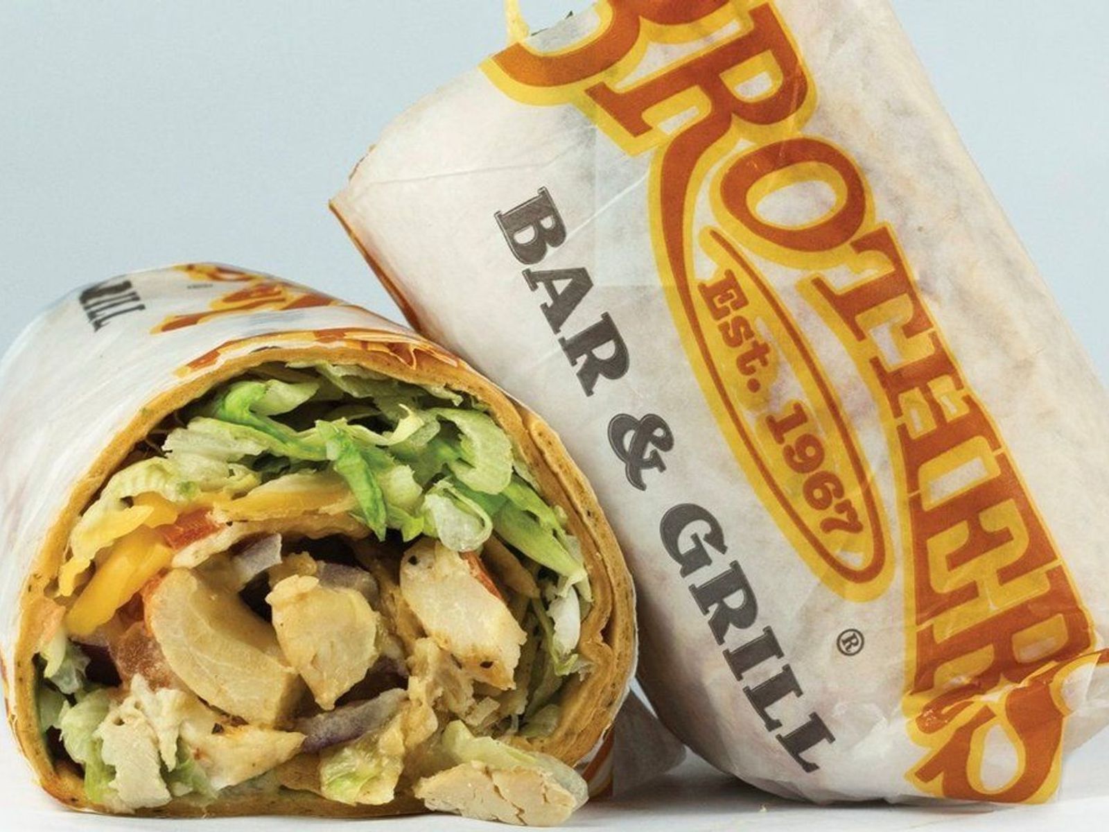 Order Queso Chicken Wrap food online from Brothers Bar & Grill store, Fort Collins on bringmethat.com